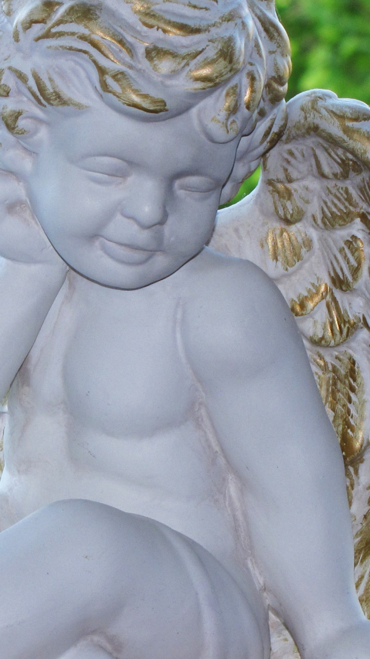 Angel Statue Near Green Grass During Daytime. Wallpaper in 750x1334 Resolution