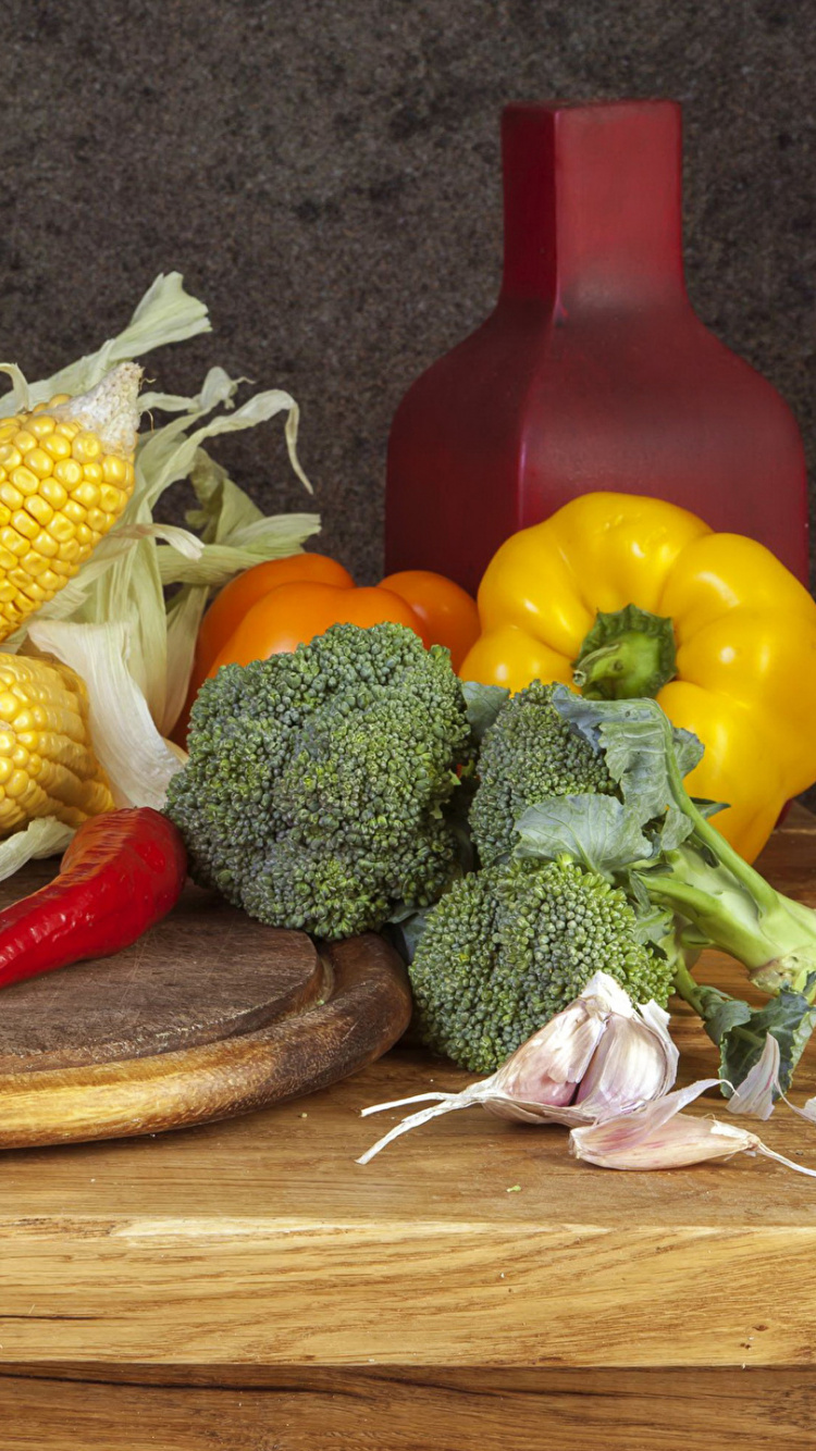 Yellow Corn Red Bell Pepper and Green Vegetable on Brown Wooden Chopping Board. Wallpaper in 750x1334 Resolution