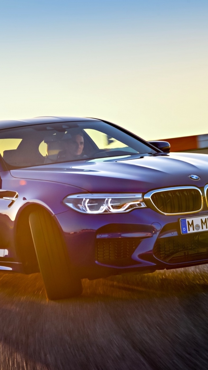 Brown Audi a 4 Coupe. Wallpaper in 720x1280 Resolution