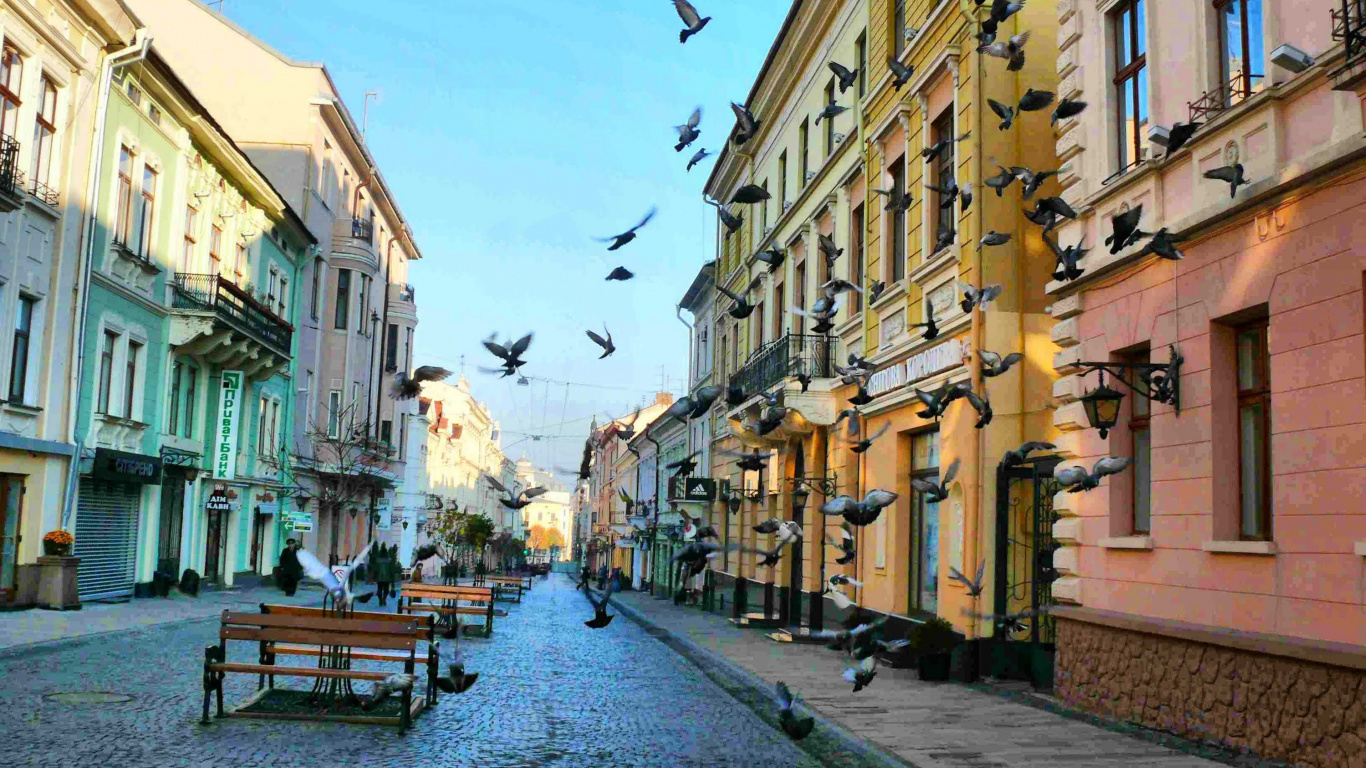 People Walking on Sidewalk Near Buildings During Daytime. Wallpaper in 1366x768 Resolution