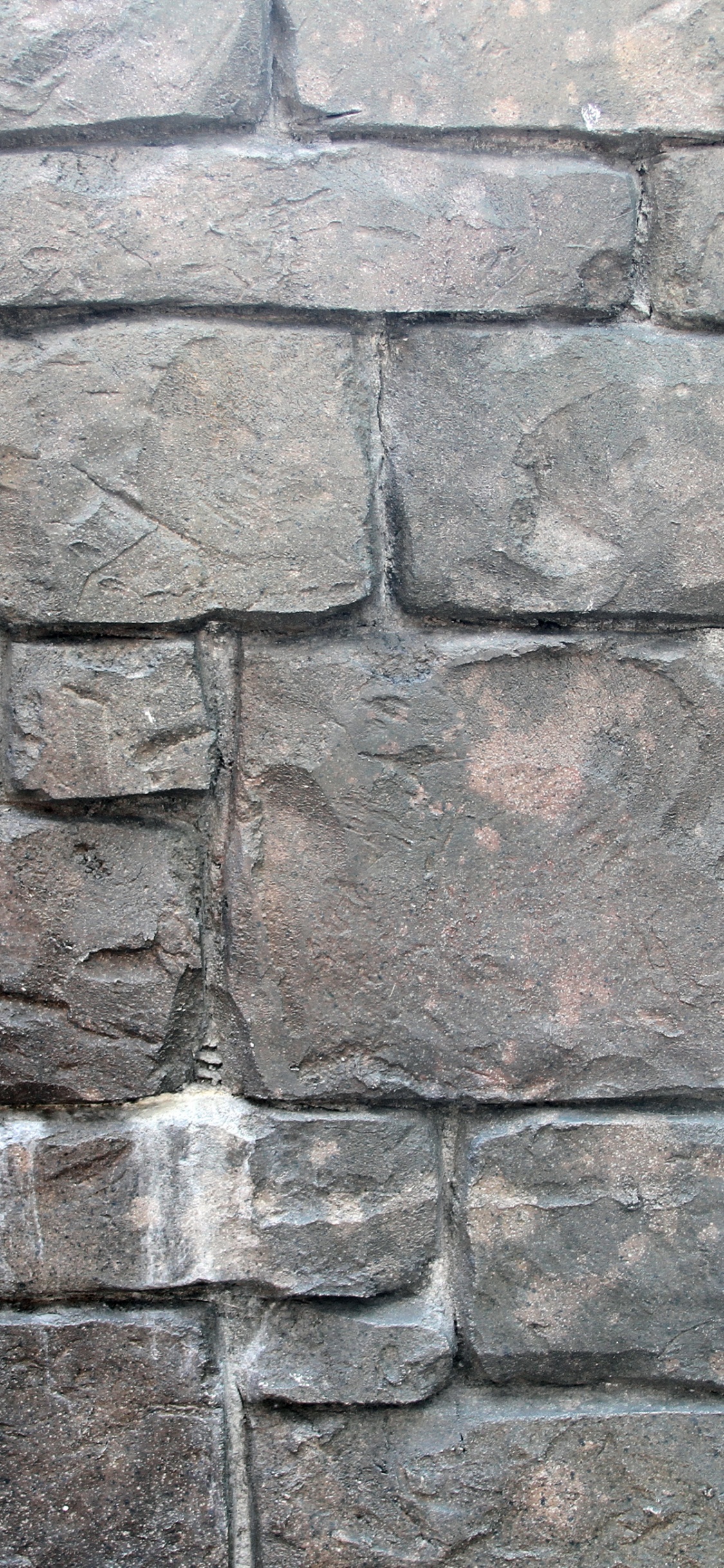 Mur de Briques Brunes et Grises. Wallpaper in 1125x2436 Resolution