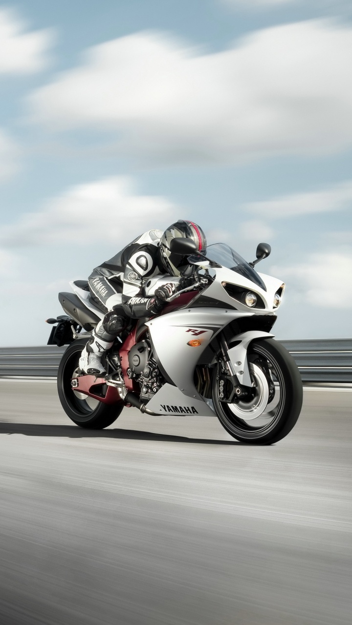 Man Riding on Sports Bike on Road During Daytime. Wallpaper in 720x1280 Resolution