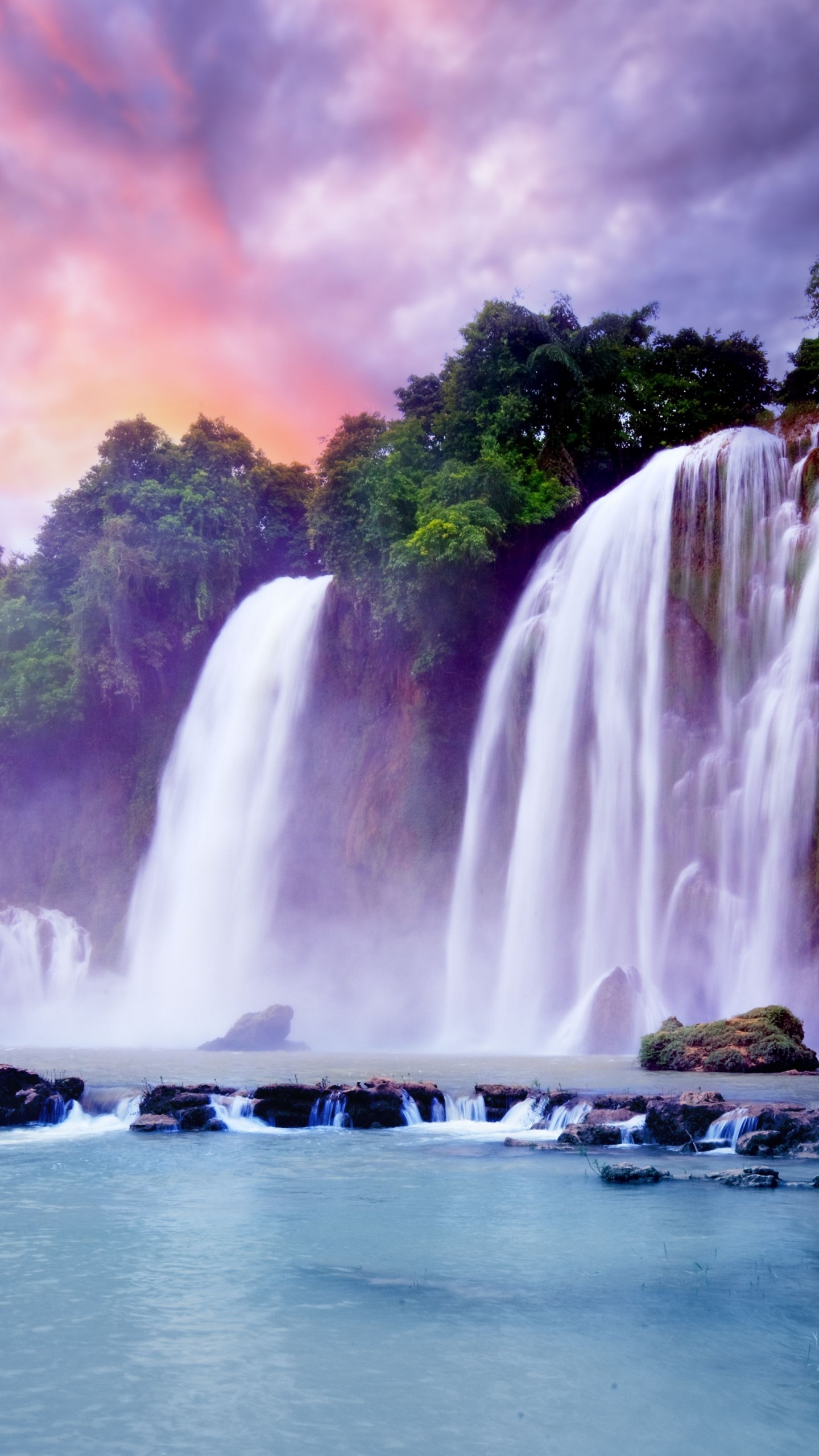 Waterfalls Near Green Trees Under Cloudy Sky During Daytime. Wallpaper in 1440x2560 Resolution