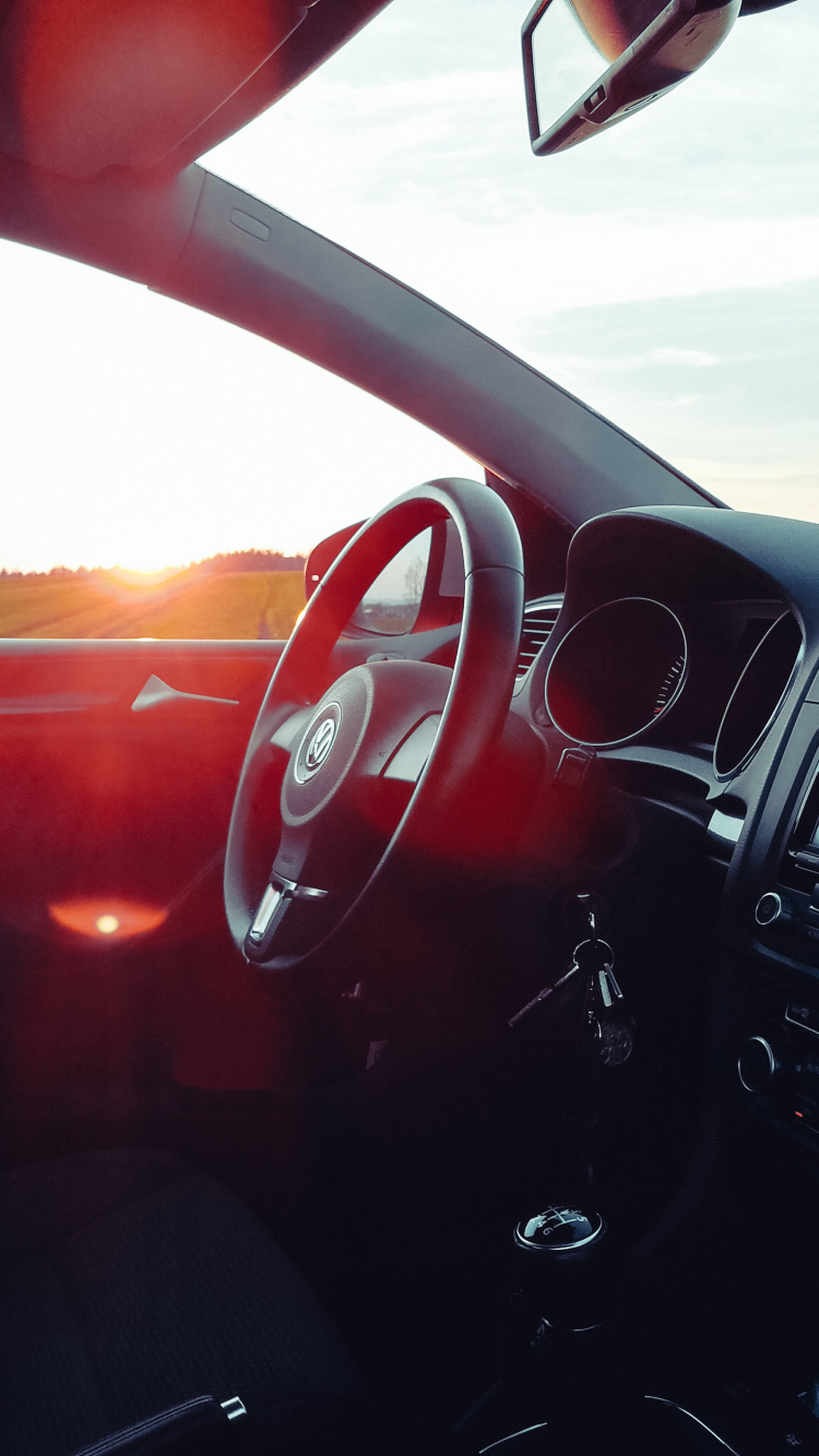 Car on Road During Daytime. Wallpaper in 750x1334 Resolution