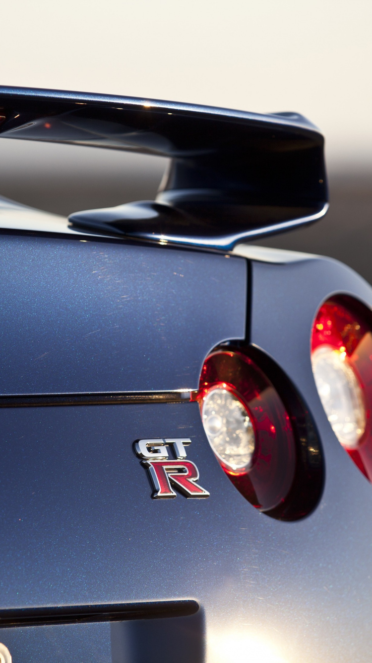 Black Porsche 911 on Gray Pavement. Wallpaper in 750x1334 Resolution