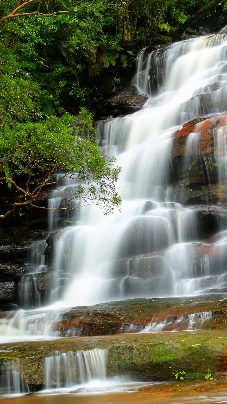 Water Falls on Brown Rock. Wallpaper in 750x1334 Resolution