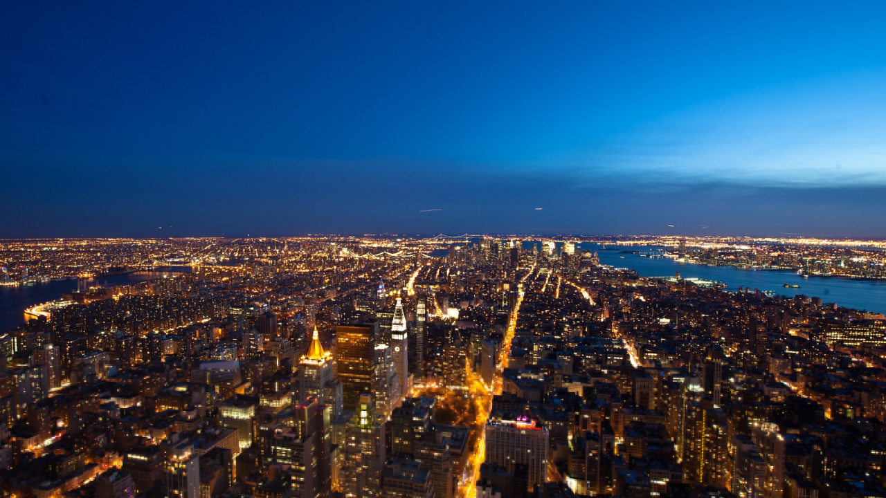 Aerial View of City Buildings During Night Time. Wallpaper in 1280x720 Resolution