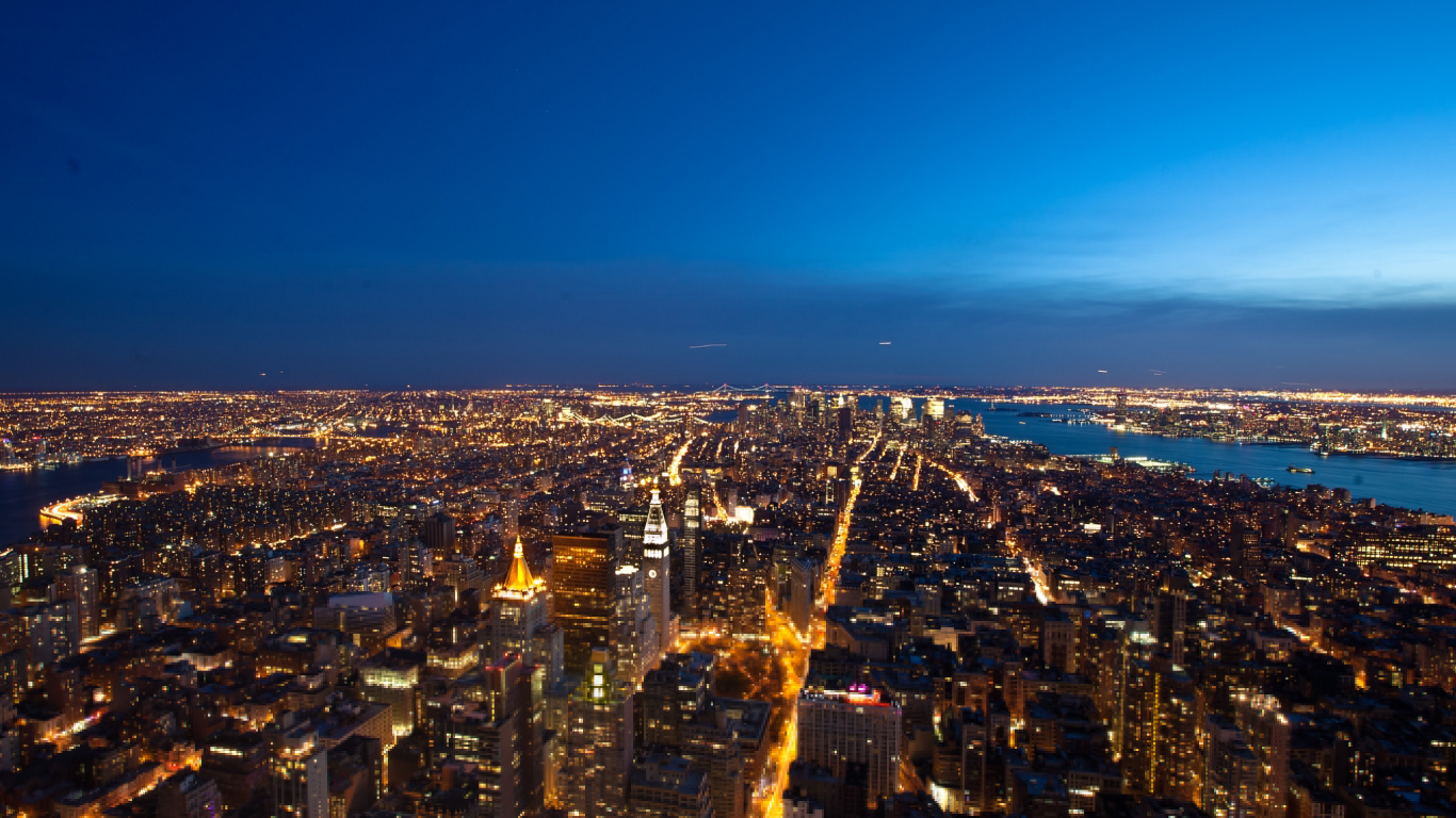 Aerial View of City Buildings During Night Time. Wallpaper in 1366x768 Resolution