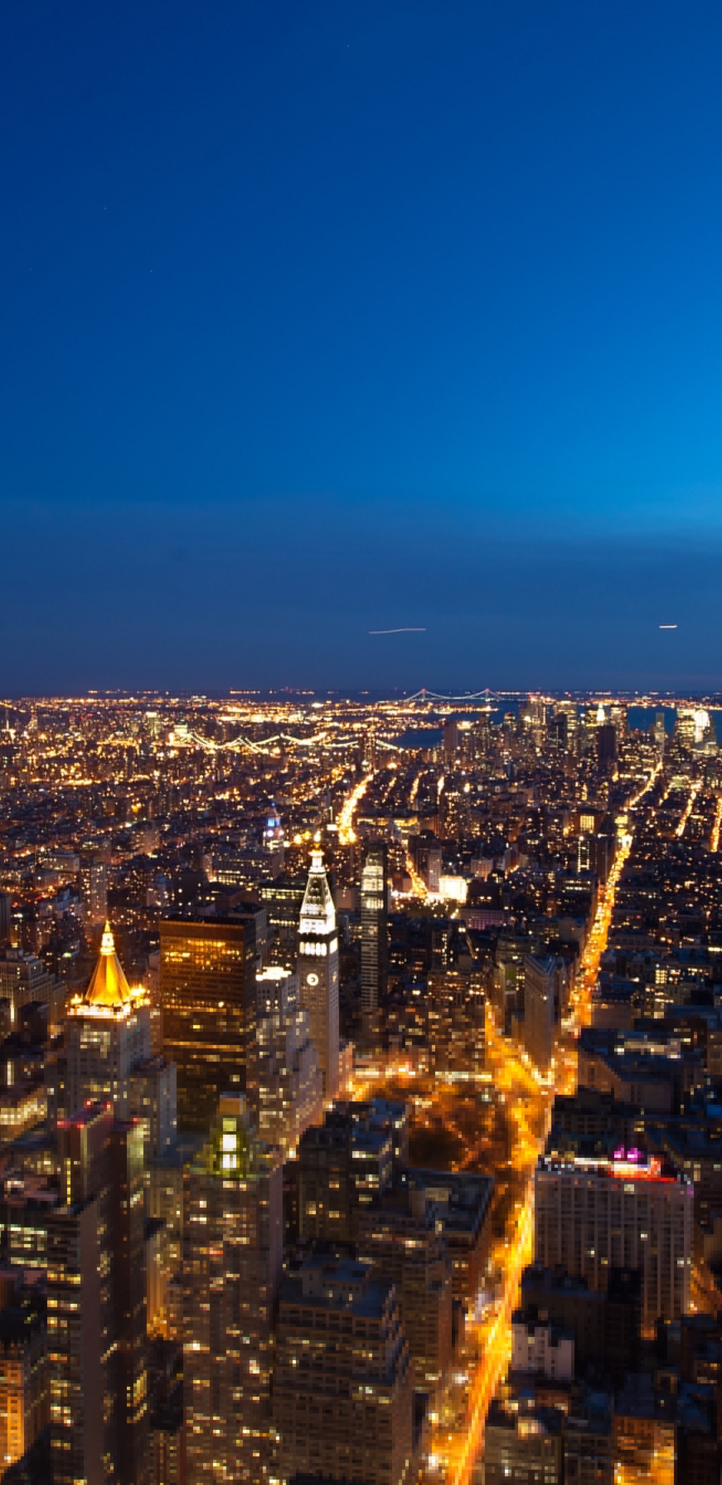 Aerial View of City Buildings During Night Time. Wallpaper in 1440x2960 Resolution