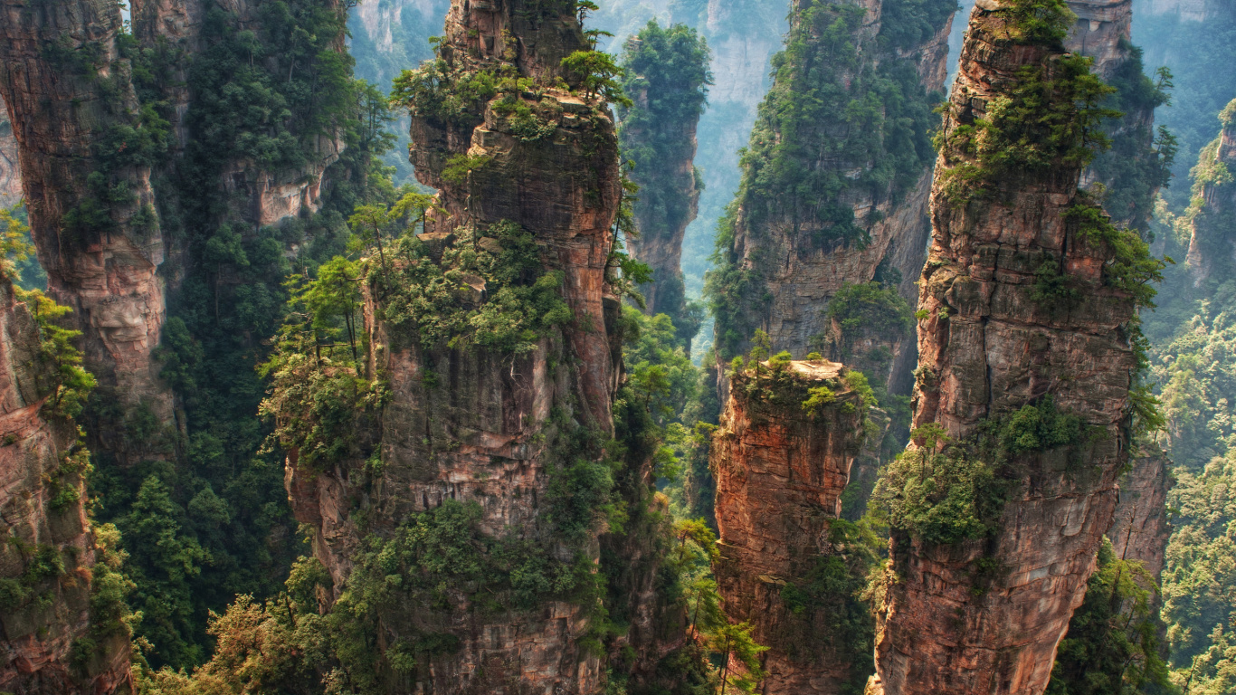 Green and Brown Rocky Mountain. Wallpaper in 1366x768 Resolution