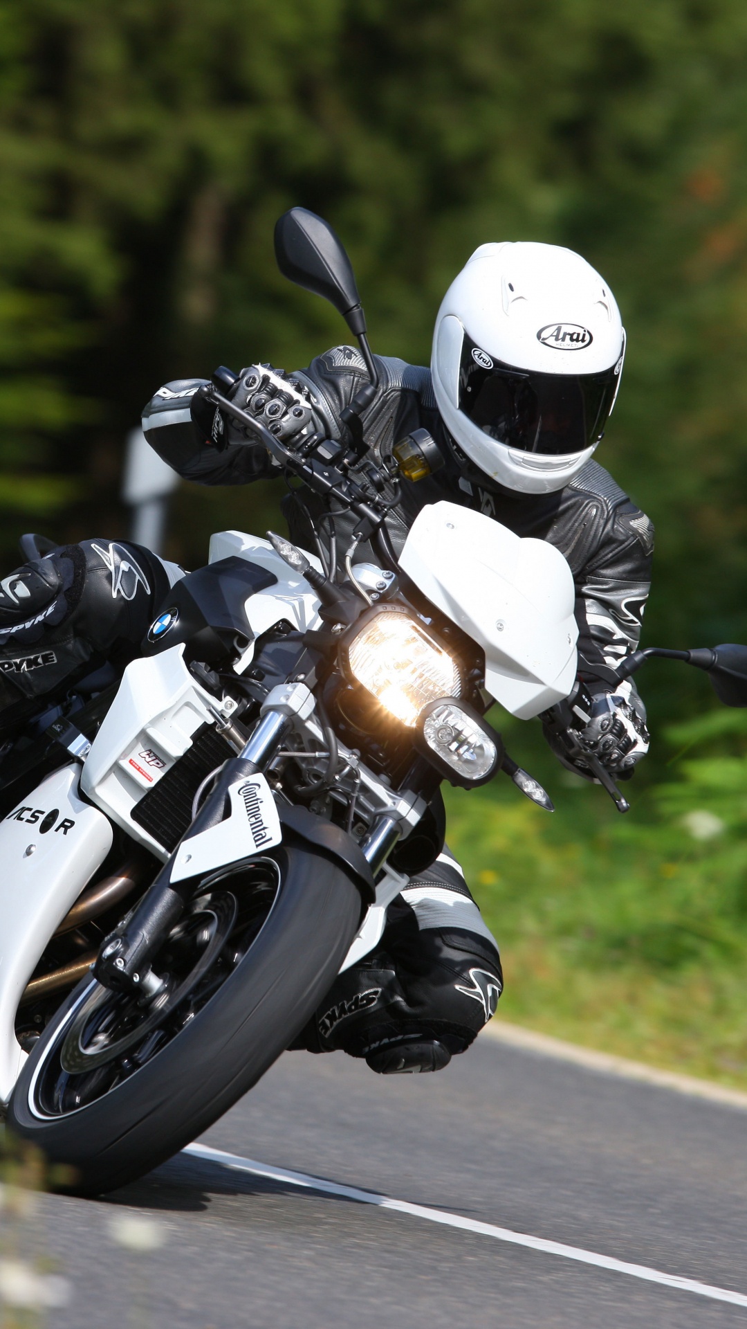 Man in Black Helmet Riding Motorcycle on Road During Daytime. Wallpaper in 1080x1920 Resolution