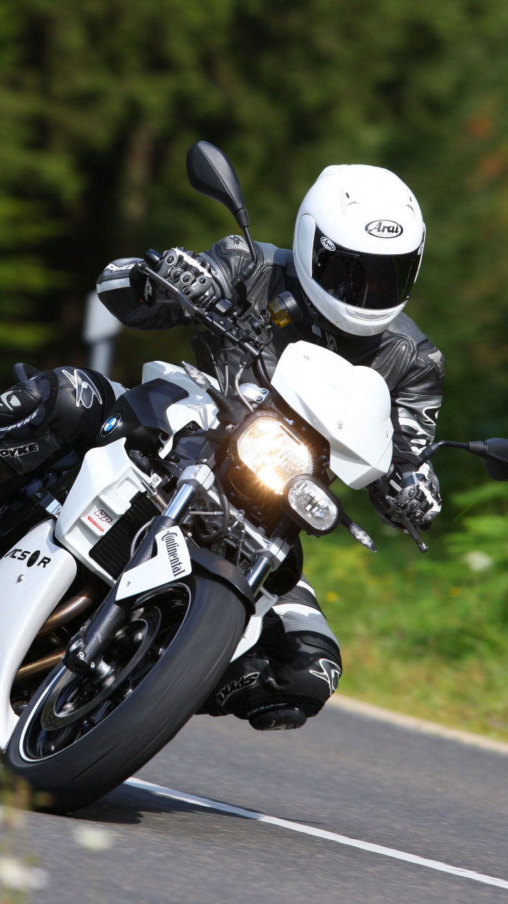 Man in Black Helmet Riding Motorcycle on Road During Daytime. Wallpaper in 720x1280 Resolution