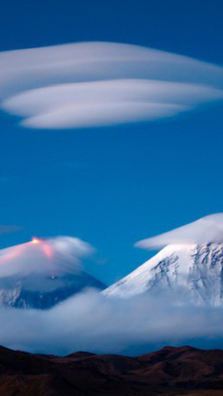 Snow Covered Mountain Under Blue Sky During Daytime. Wallpaper in 750x1334 Resolution