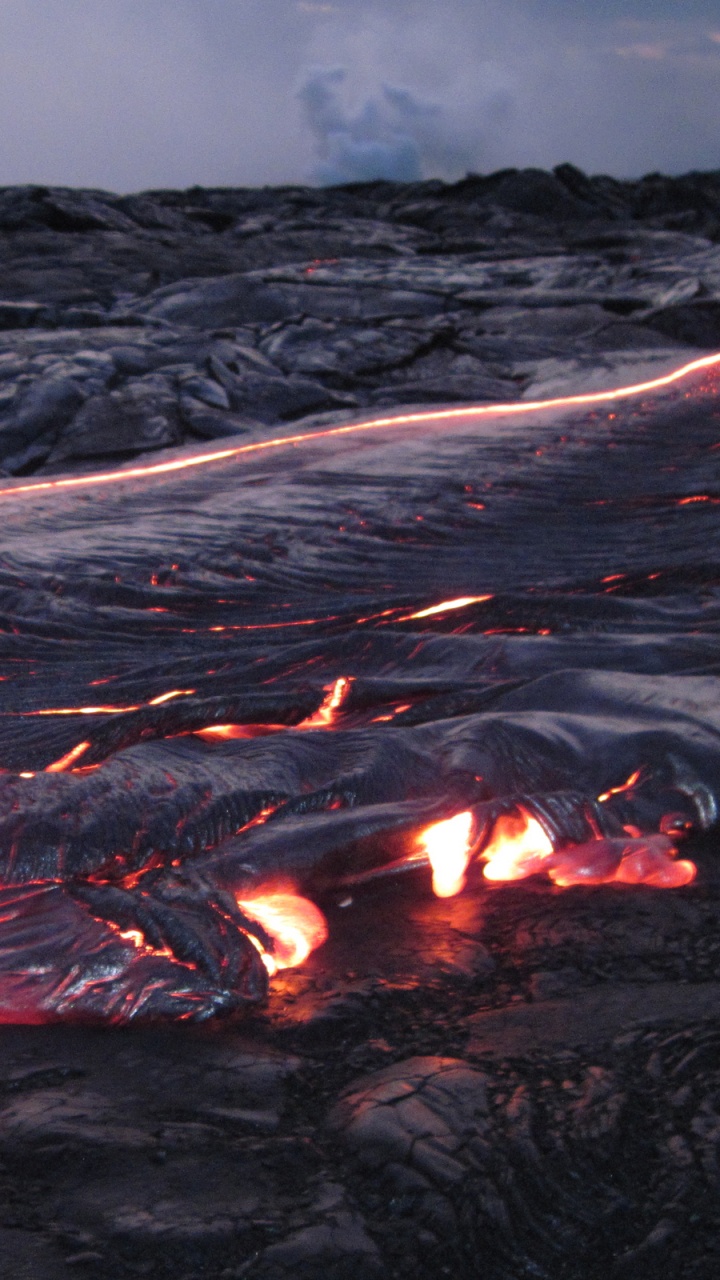 Burning Wood on Rocky Ground During Daytime. Wallpaper in 720x1280 Resolution