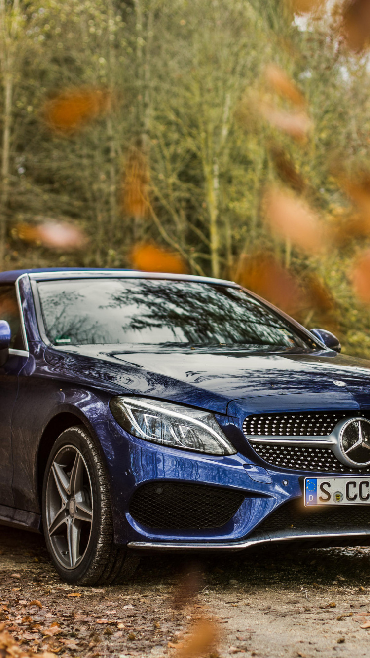 Black Mercedes Benz Coupe on Forest During Daytime. Wallpaper in 750x1334 Resolution