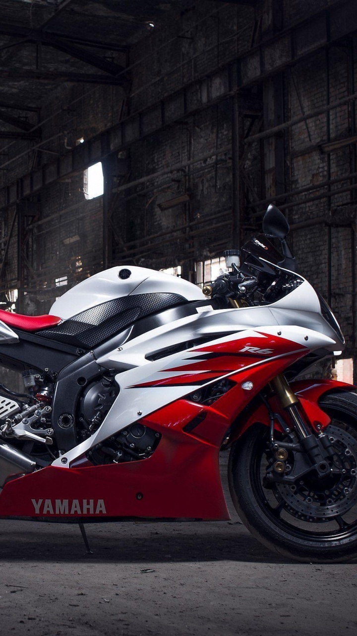 Red and Black Sports Bike Parked on Tunnel. Wallpaper in 720x1280 Resolution
