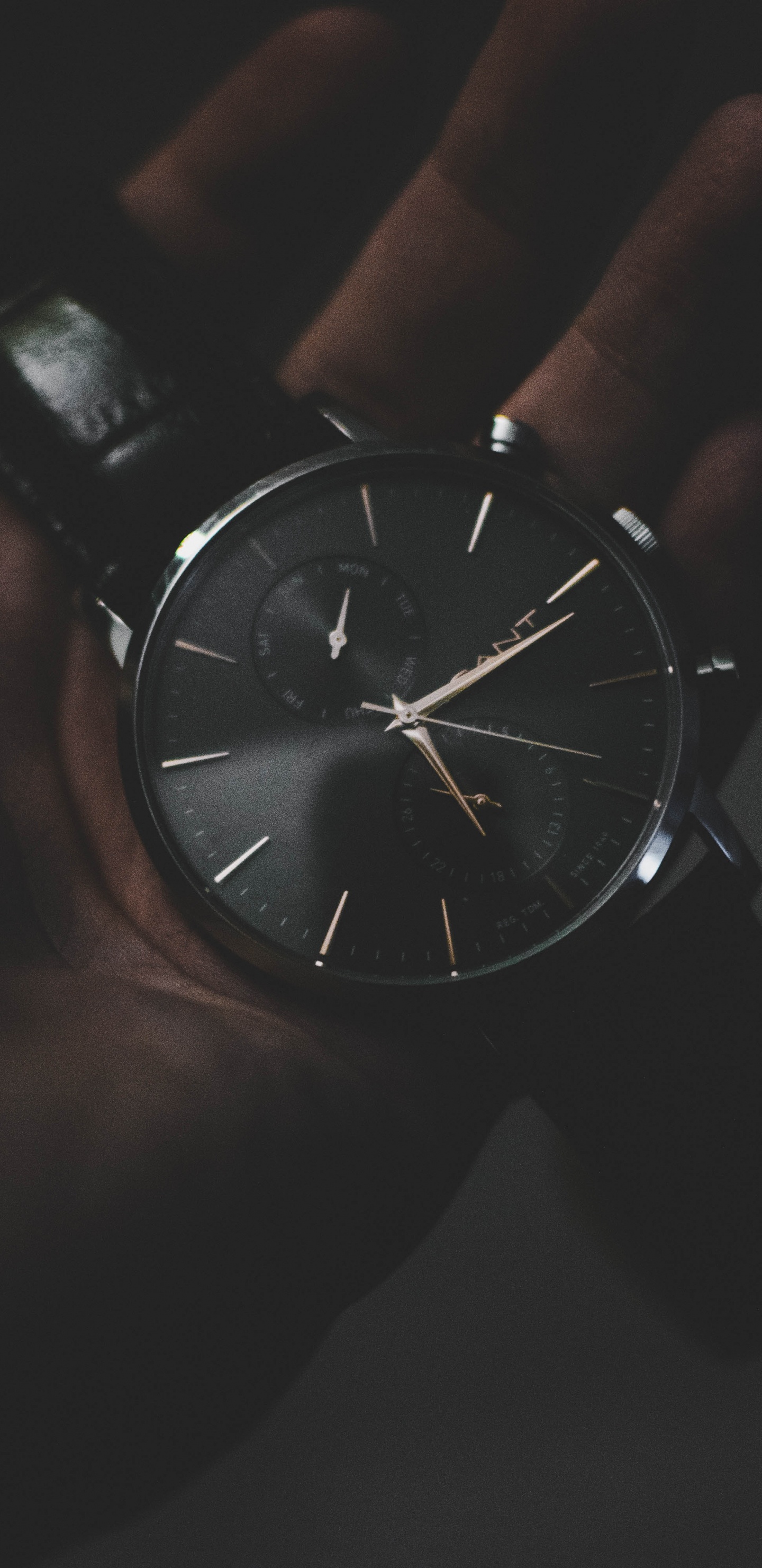 Person Holding Silver Round Analog Watch. Wallpaper in 1440x2960 Resolution