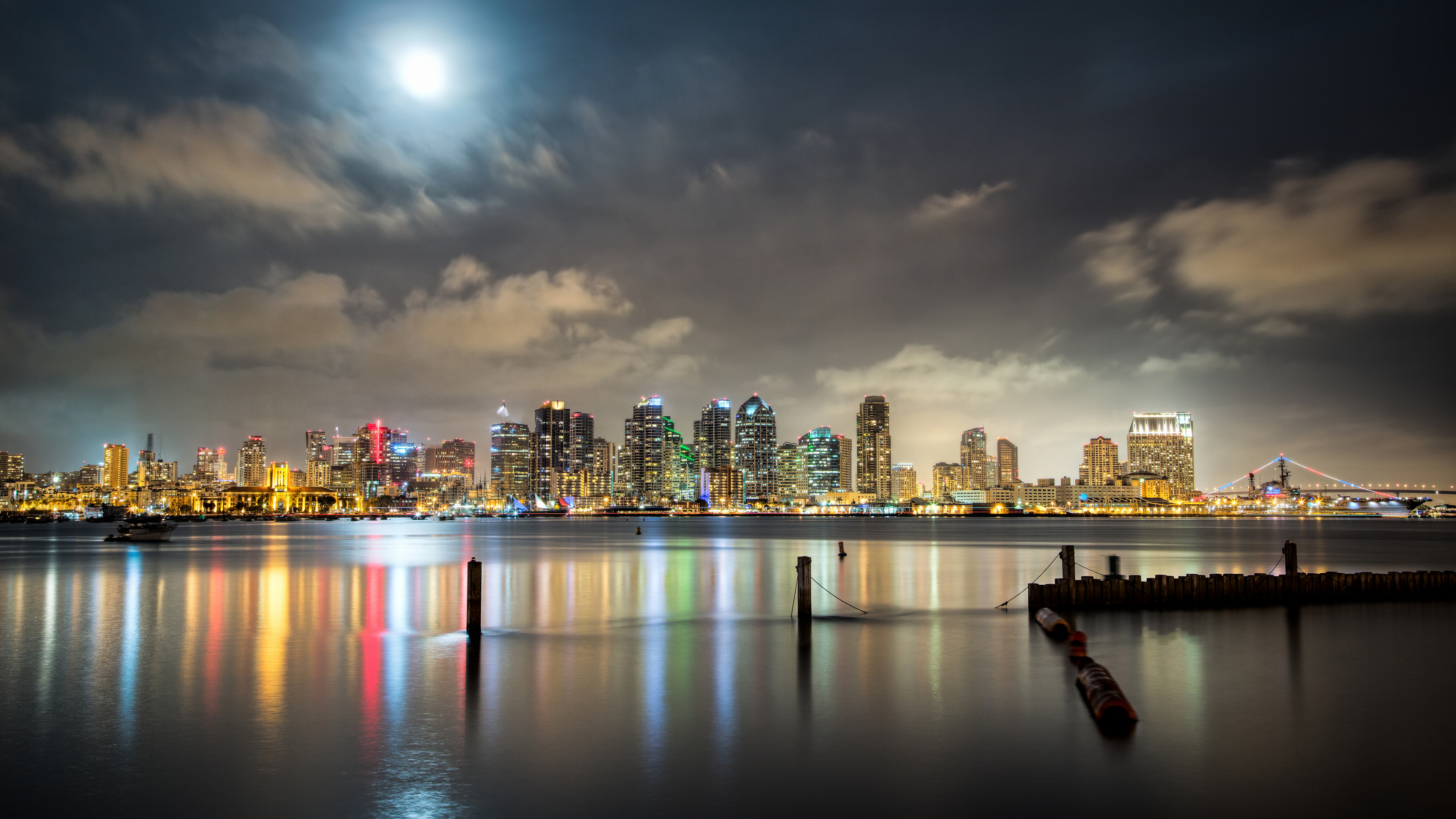 City Skyline Across Body of Water During Night Time. Wallpaper in 3840x2160 Resolution