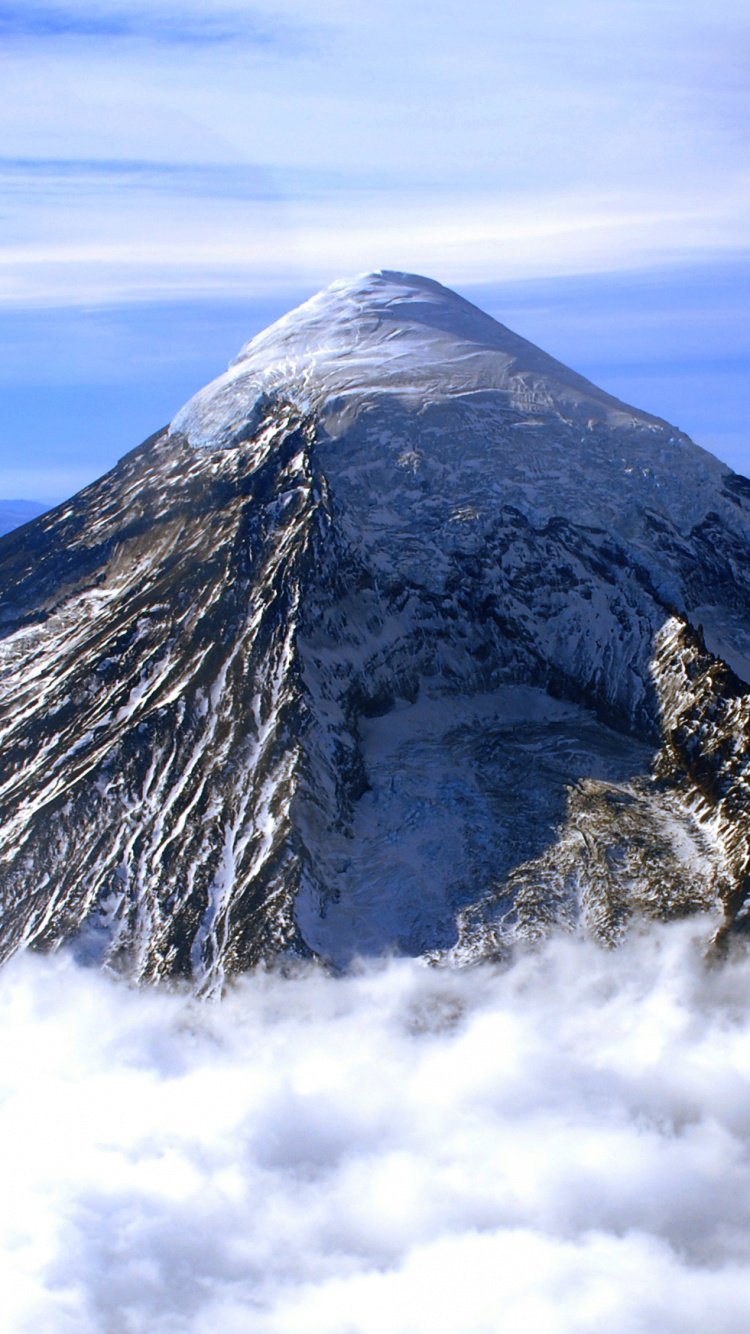 Black and White Mountain Under White Clouds and Blue Sky During Daytime. Wallpaper in 750x1334 Resolution