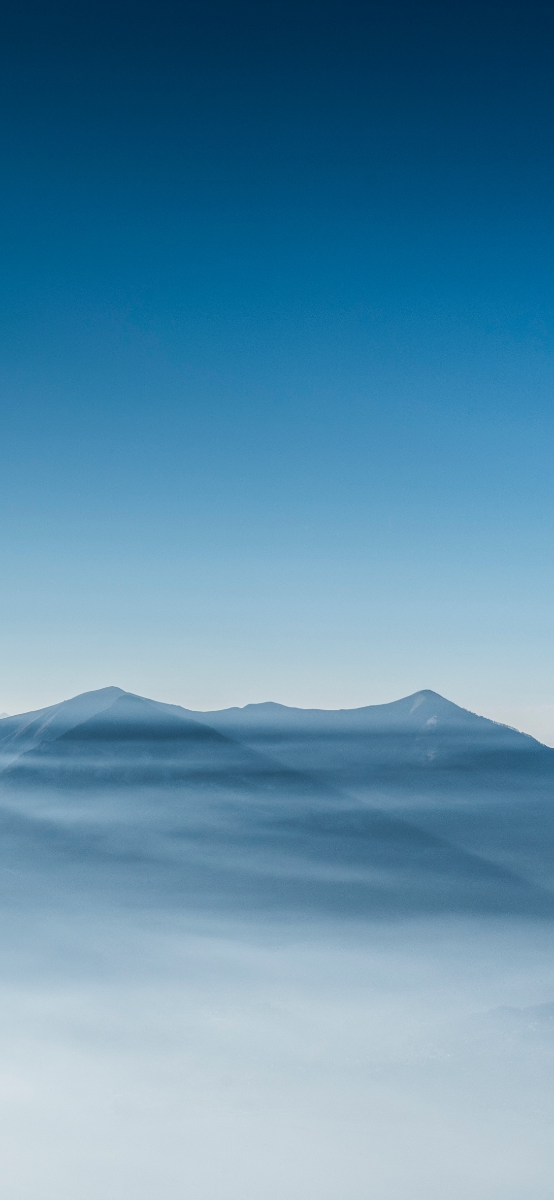 Mountain Range, Mountainous Landforms, Natural Landscape, Atmosphere, Cloud. Wallpaper in 1125x2436 Resolution