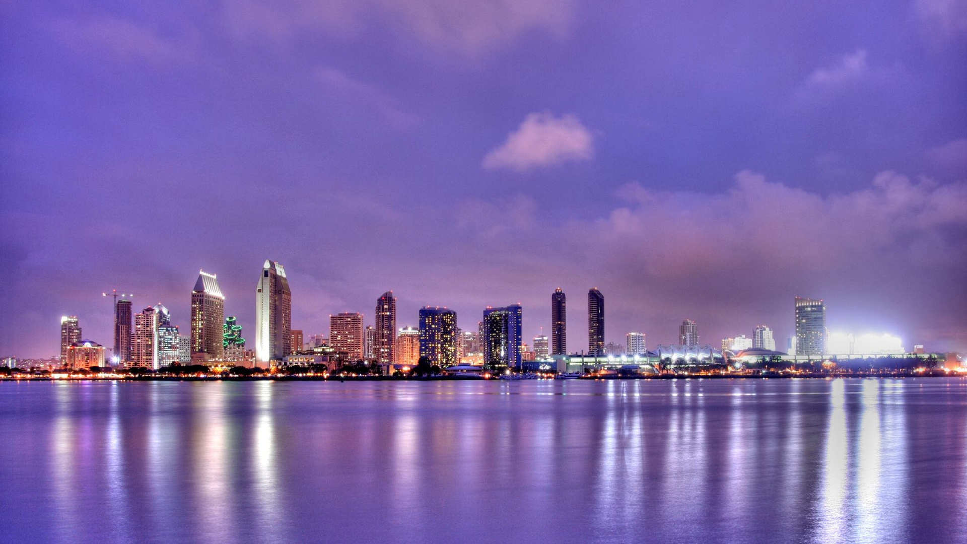 City Skyline Across Body of Water During Night Time. Wallpaper in 1920x1080 Resolution