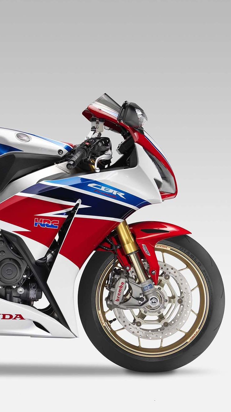 Red and Black Sports Bike. Wallpaper in 750x1334 Resolution