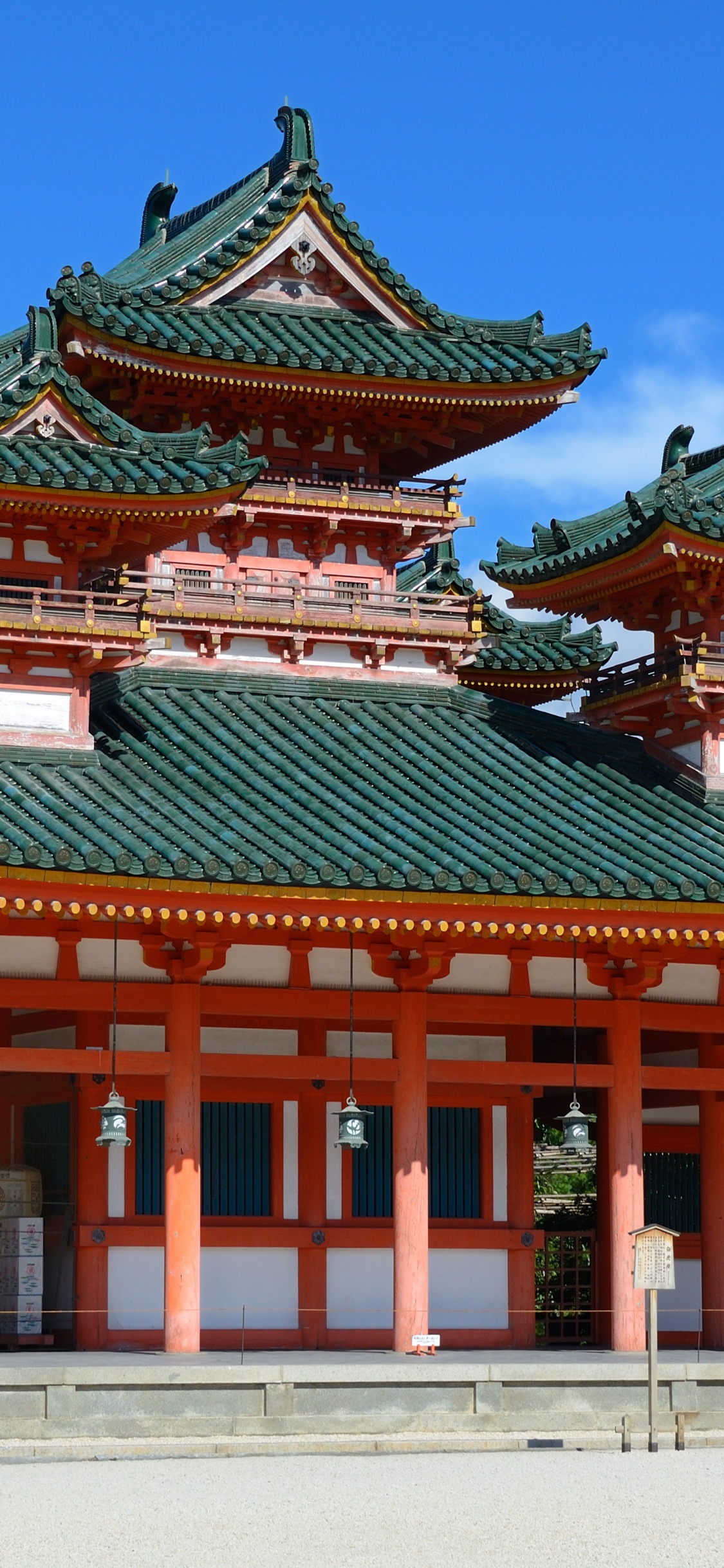 Red and Green Pagoda Temple. Wallpaper in 1125x2436 Resolution