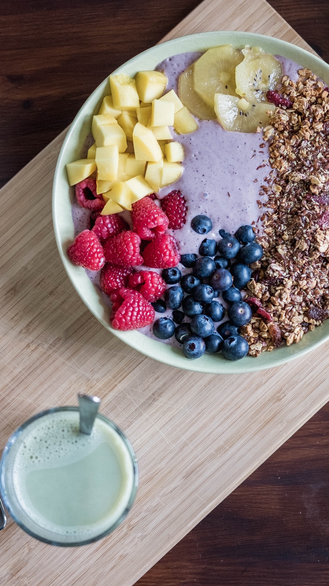 Stainless Steel Spoon Beside White Ceramic Bowl With Brown and Black Beans. Wallpaper in 1080x1920 Resolution