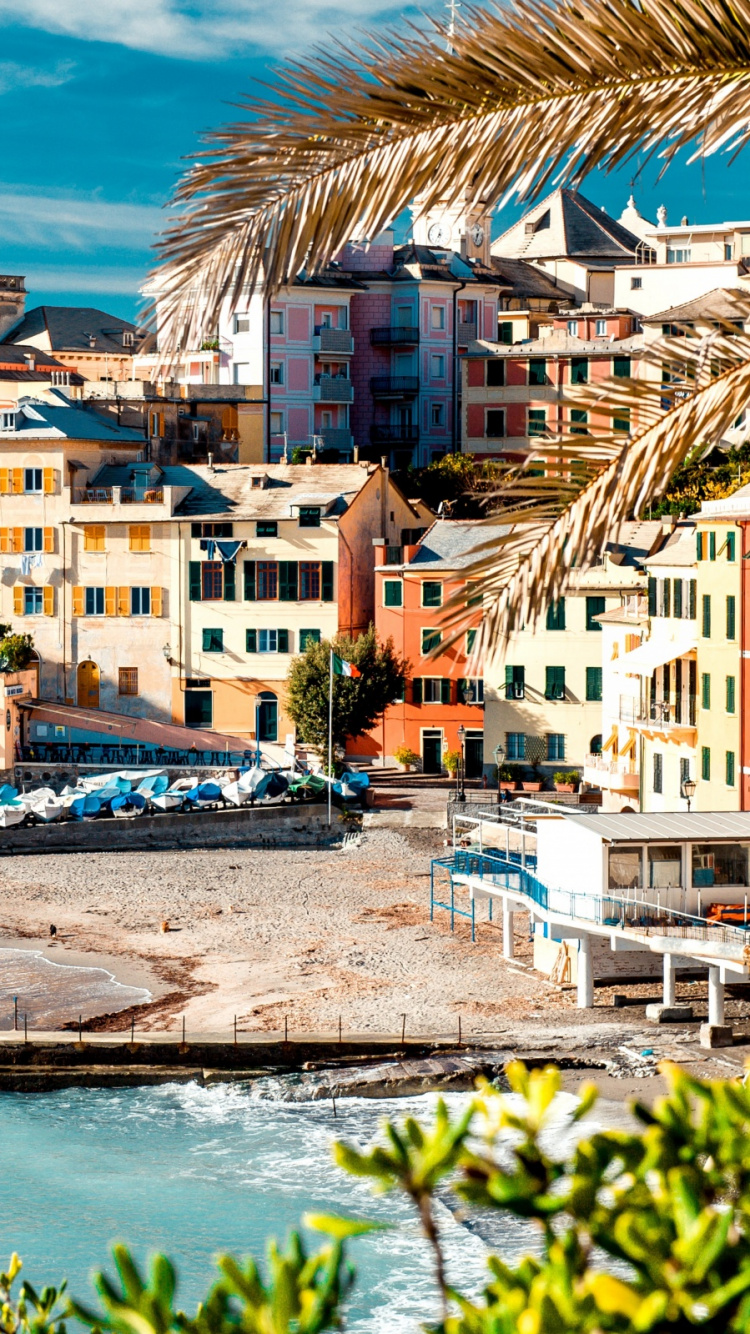 White and Brown Concrete Buildings Near Body of Water During Daytime. Wallpaper in 750x1334 Resolution