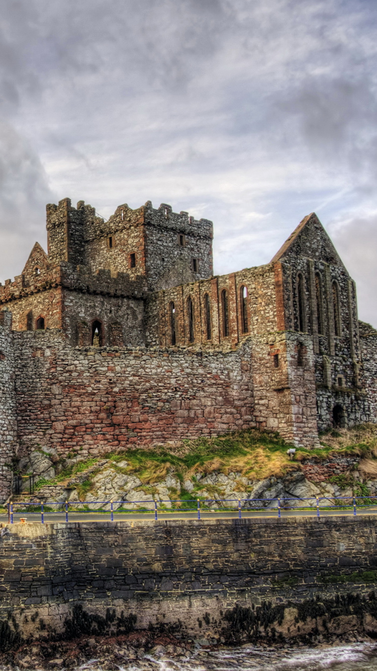 Brown Concrete Castle Under Cloudy Sky During Daytime. Wallpaper in 750x1334 Resolution