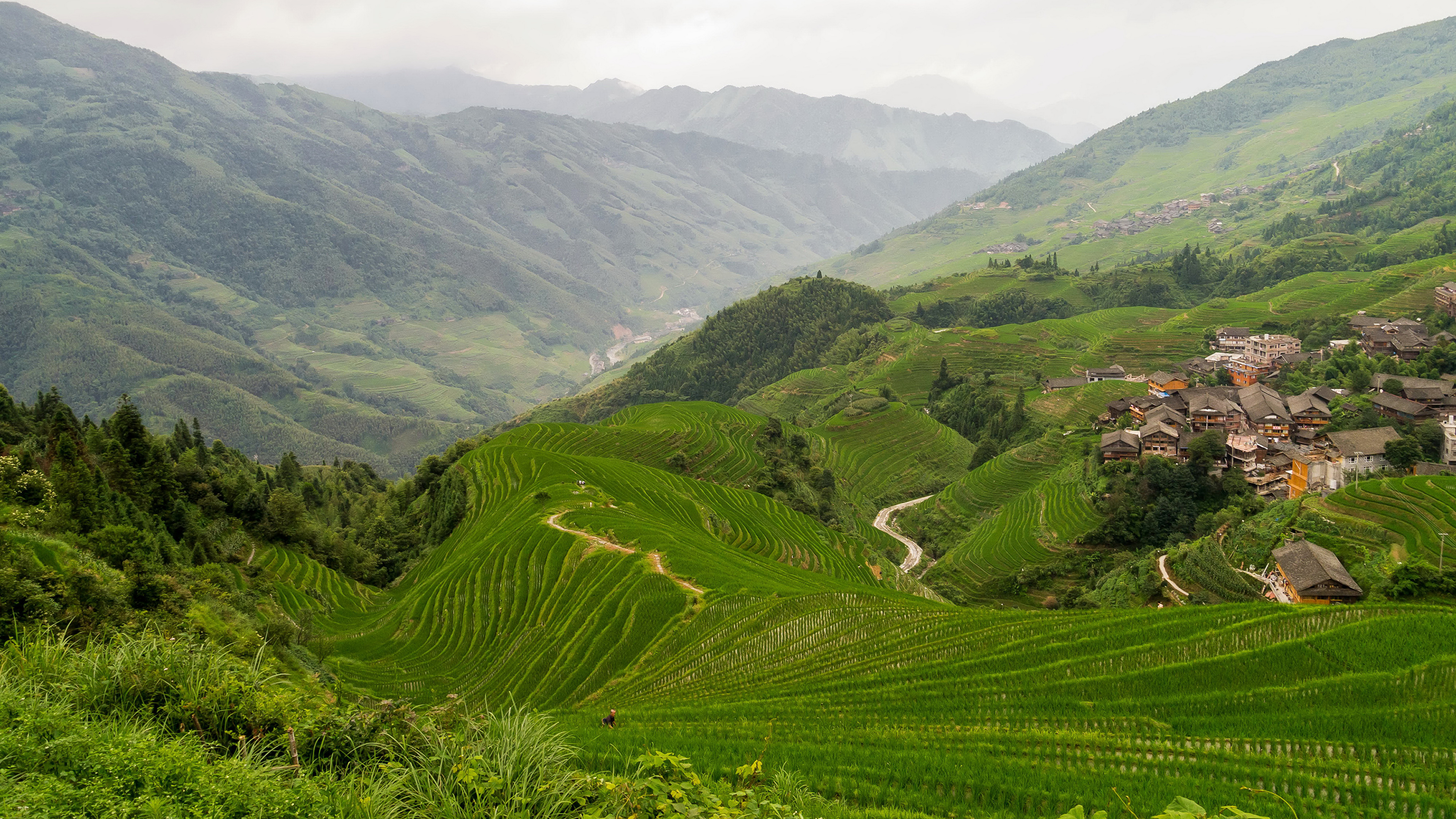 Green Mountains Under White Sky During Daytime. Wallpaper in 3840x2160 Resolution