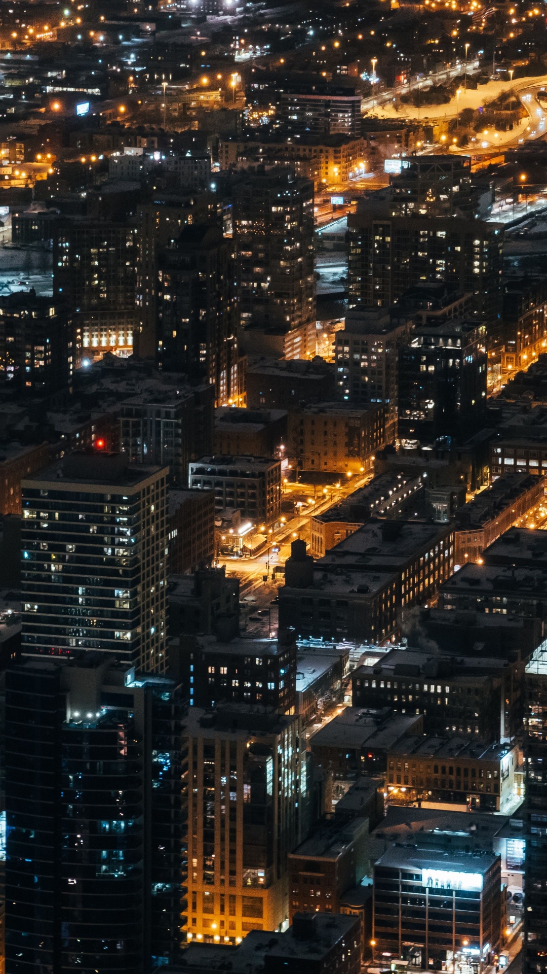 Vista Aérea de Los Edificios de la Ciudad Durante la Noche.. Wallpaper in 1080x1920 Resolution