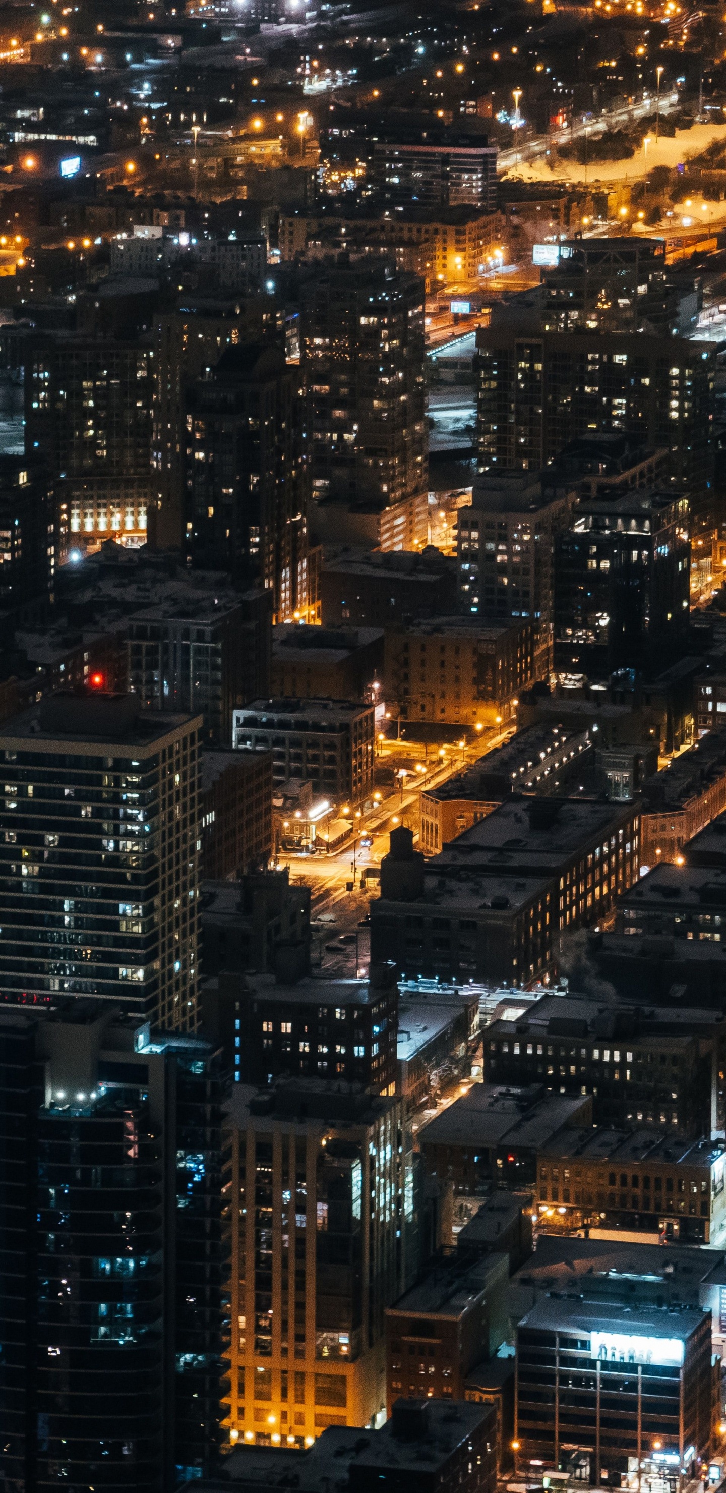 Vista Aérea de Los Edificios de la Ciudad Durante la Noche.. Wallpaper in 1440x2960 Resolution
