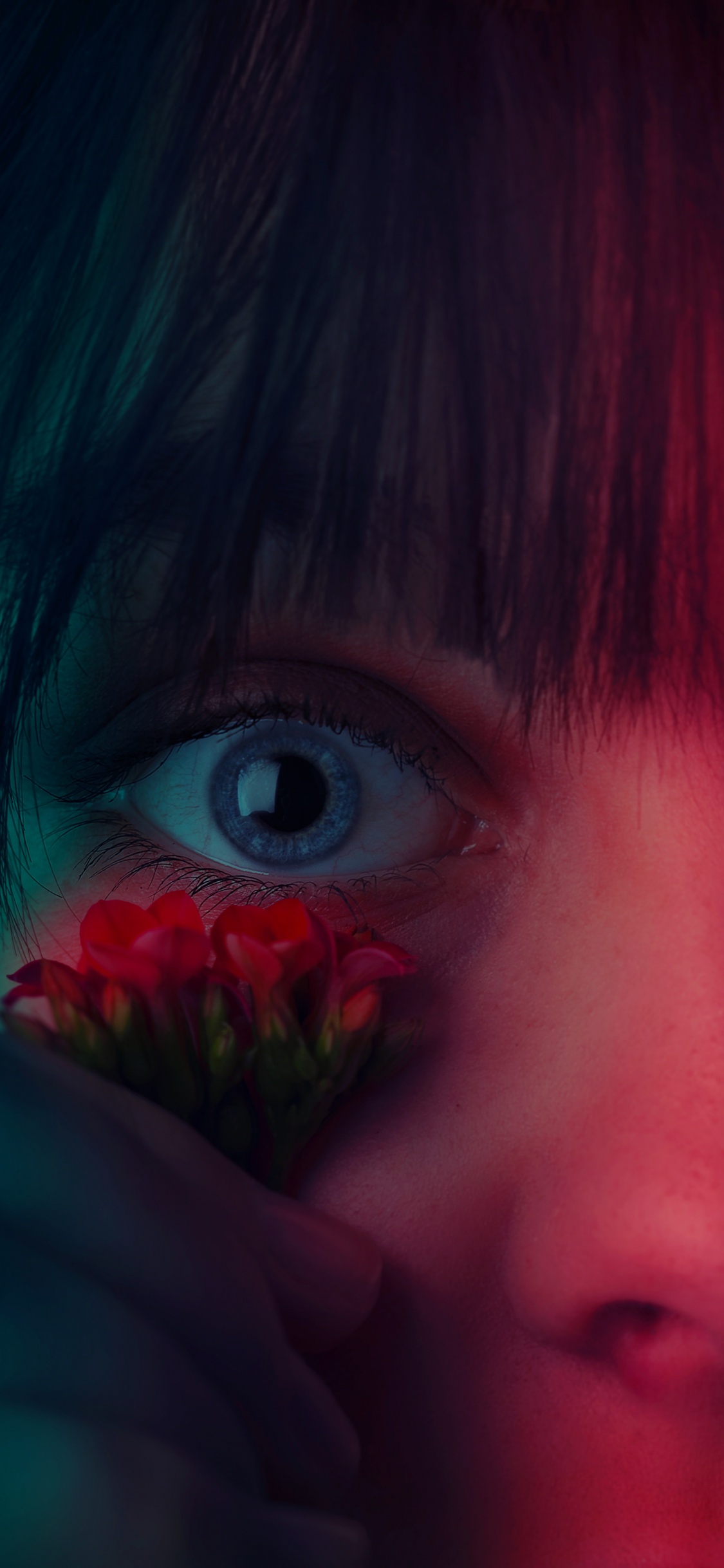 Girl With Red Flower on Her Face. Wallpaper in 1125x2436 Resolution