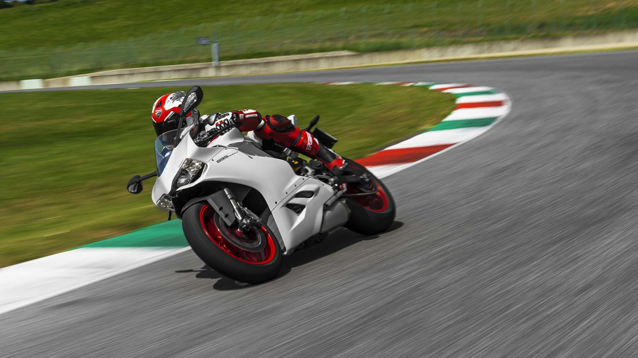 White and Black Sports Bike on Track Field During Daytime. Wallpaper in 1280x720 Resolution