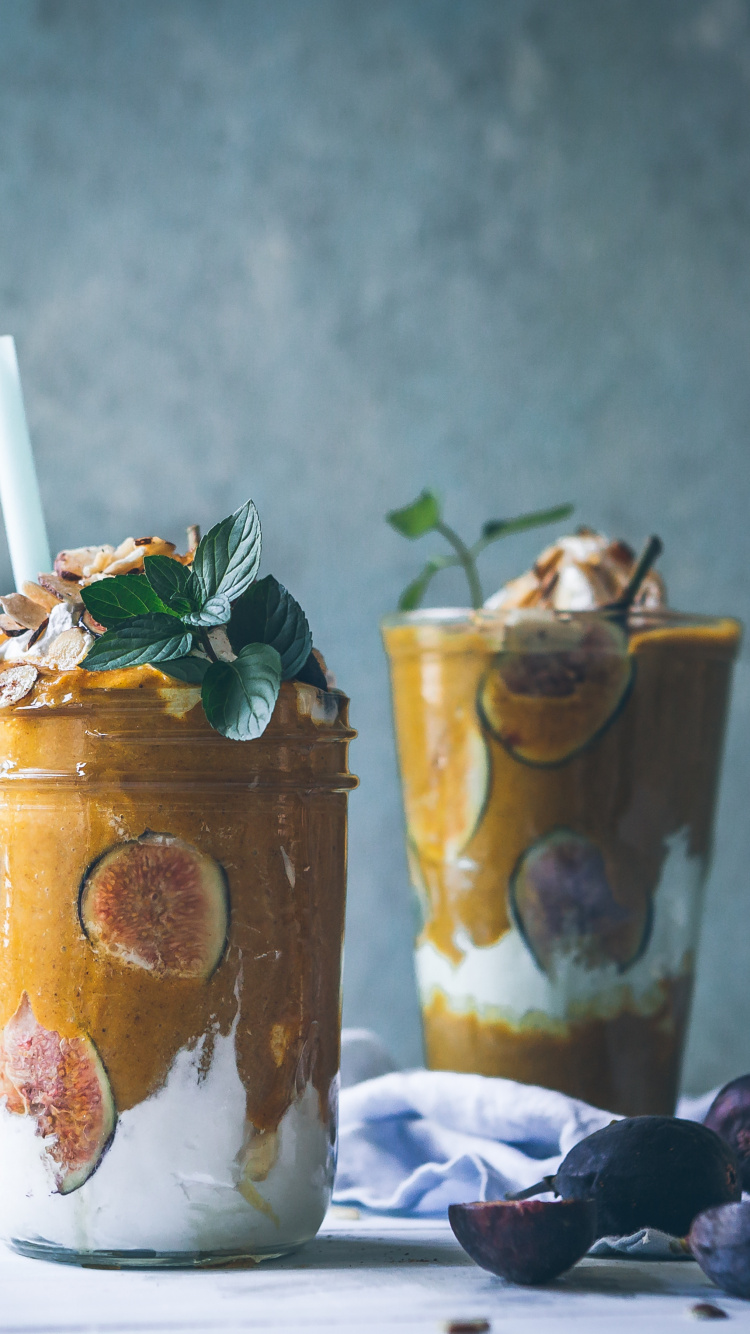 Vaso Transparente Con Líquido Amarillo. Wallpaper in 750x1334 Resolution