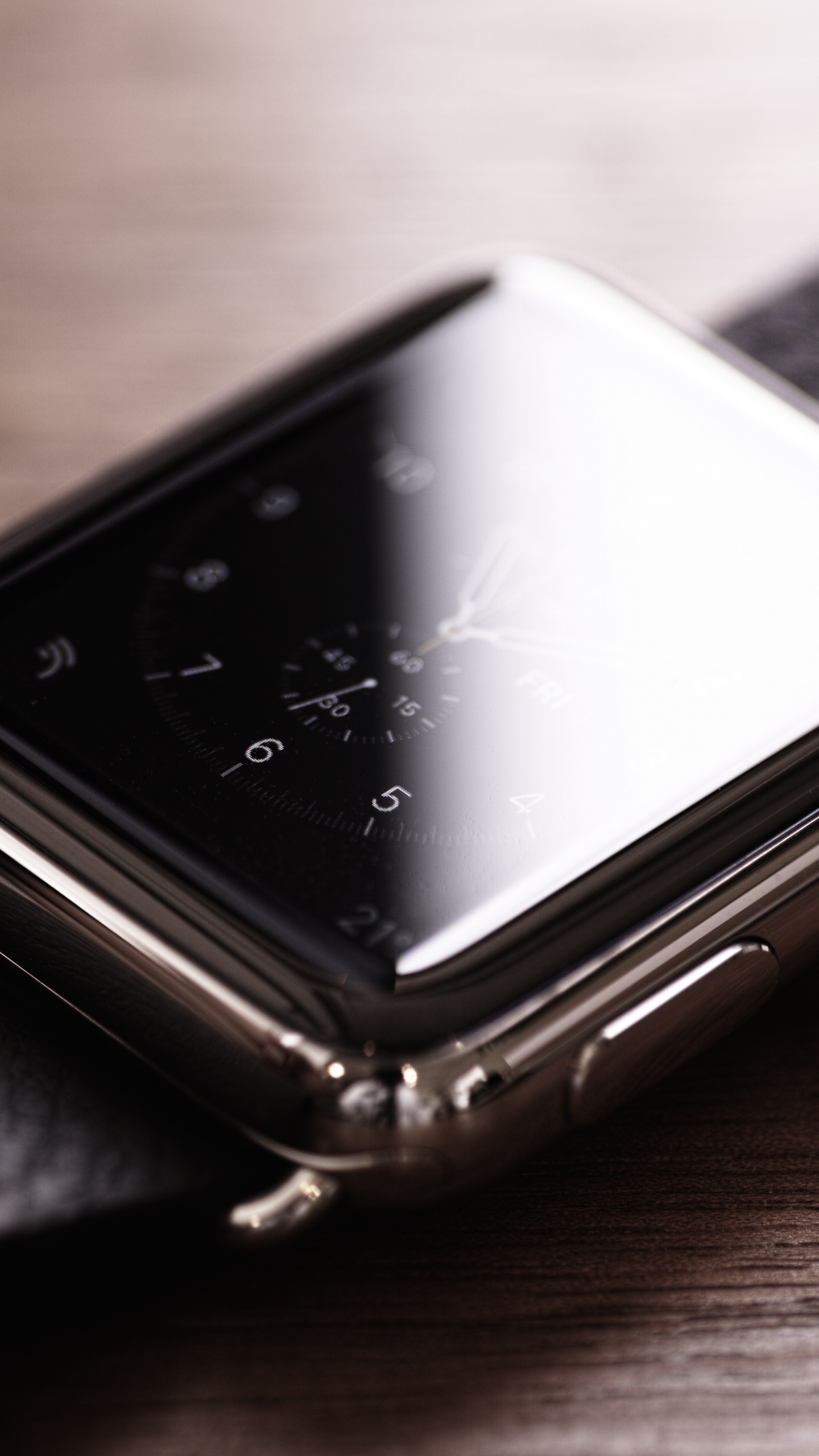 Silver Apple Watch on Brown Wooden Table. Wallpaper in 1440x2560 Resolution