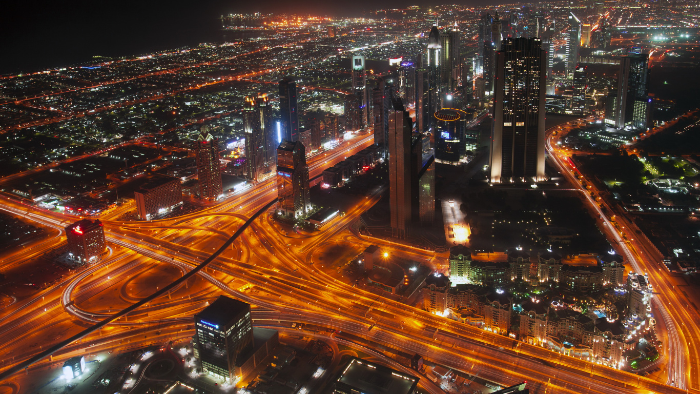 City With High Rise Buildings During Night Time. Wallpaper in 1366x768 Resolution