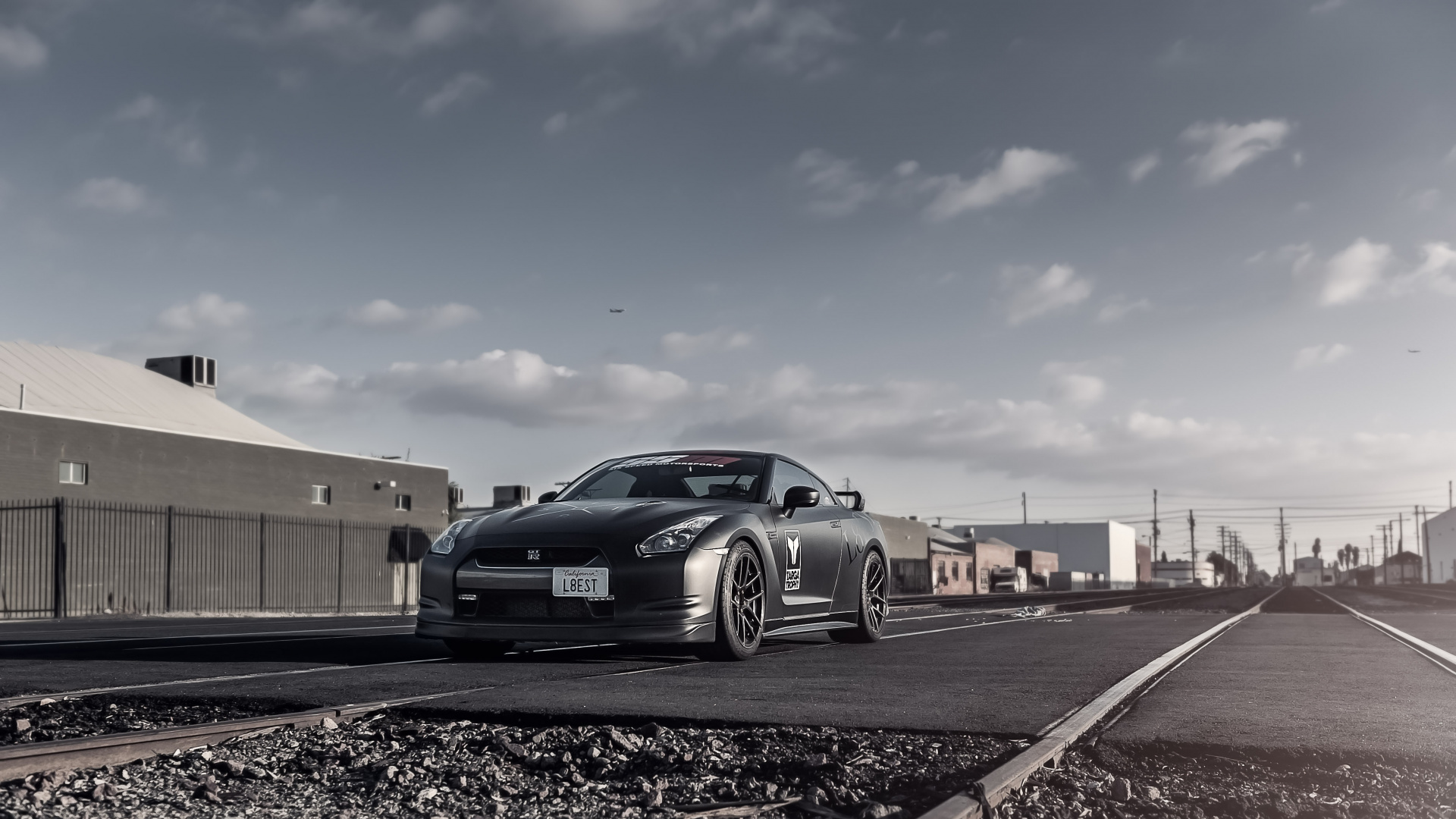 Black Sedan Parked on Side of Road During Daytime. Wallpaper in 1920x1080 Resolution