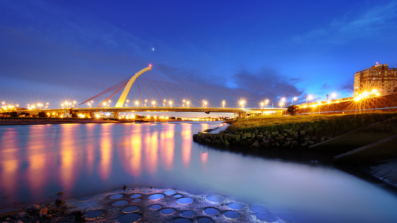 Bridge Over Water During Night Time. Wallpaper in 1280x720 Resolution