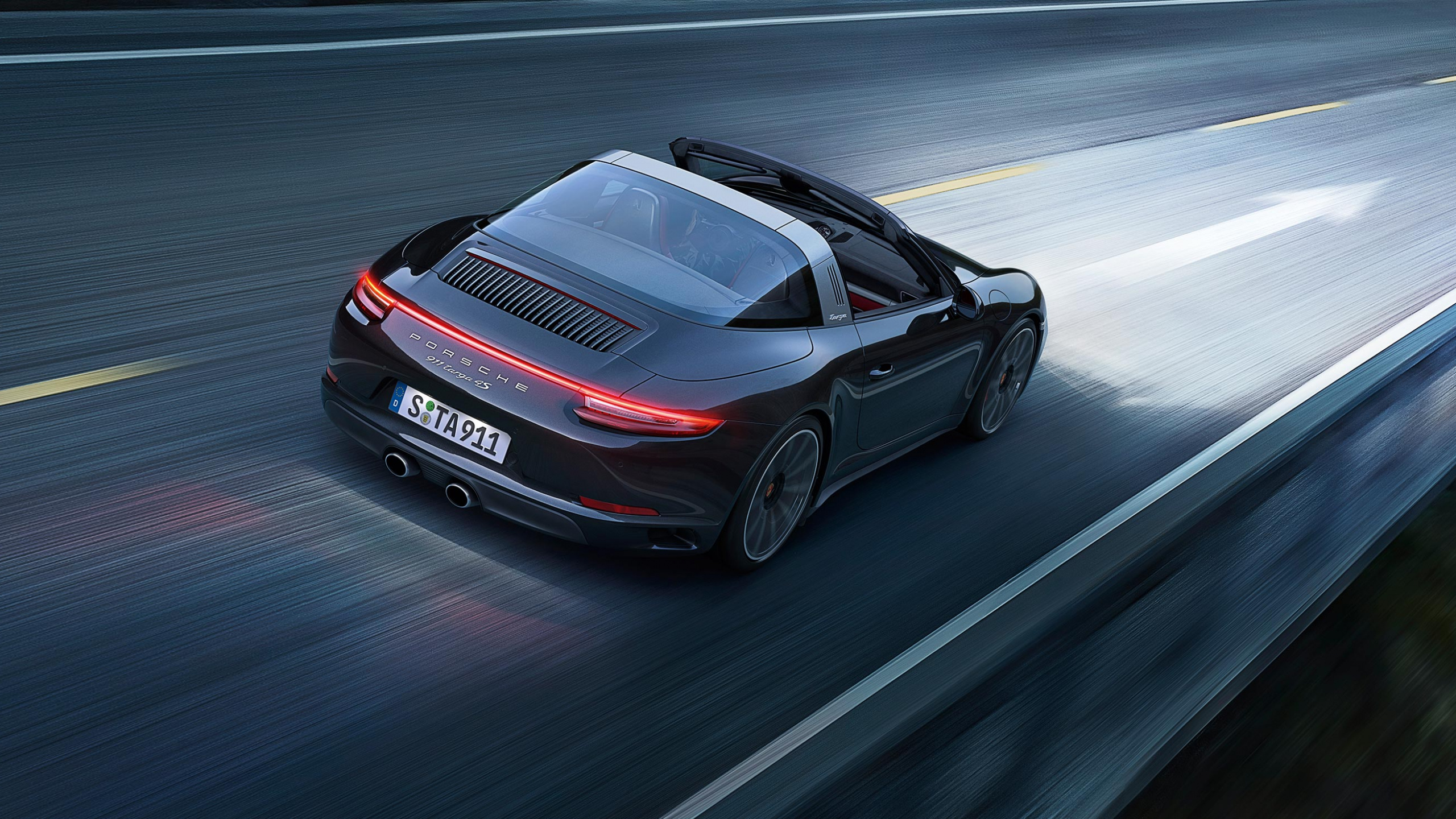 Red Porsche 911 on Road. Wallpaper in 2560x1440 Resolution