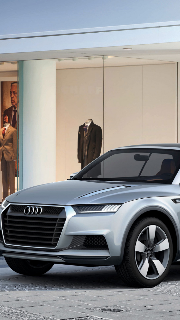 Audi Argent un Coupé 4 Garé Devant un Immeuble. Wallpaper in 750x1334 Resolution