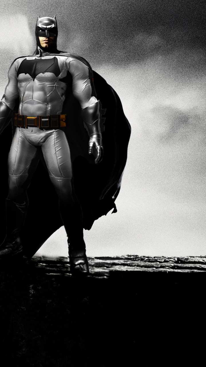 Homme en Veste Noire et Pantalon Debout Sur Rock. Wallpaper in 720x1280 Resolution