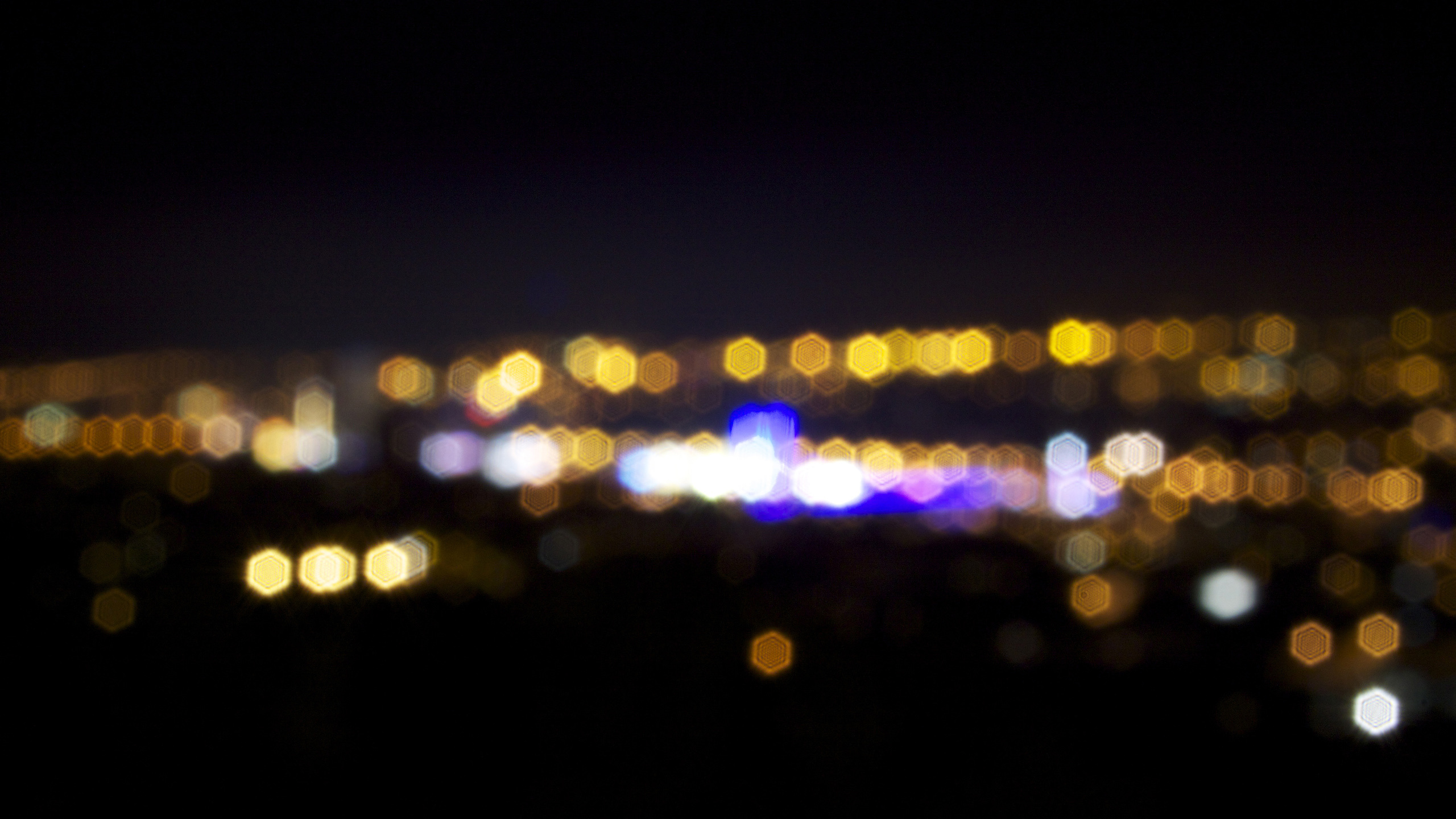 City Lights During Night Time. Wallpaper in 2560x1440 Resolution