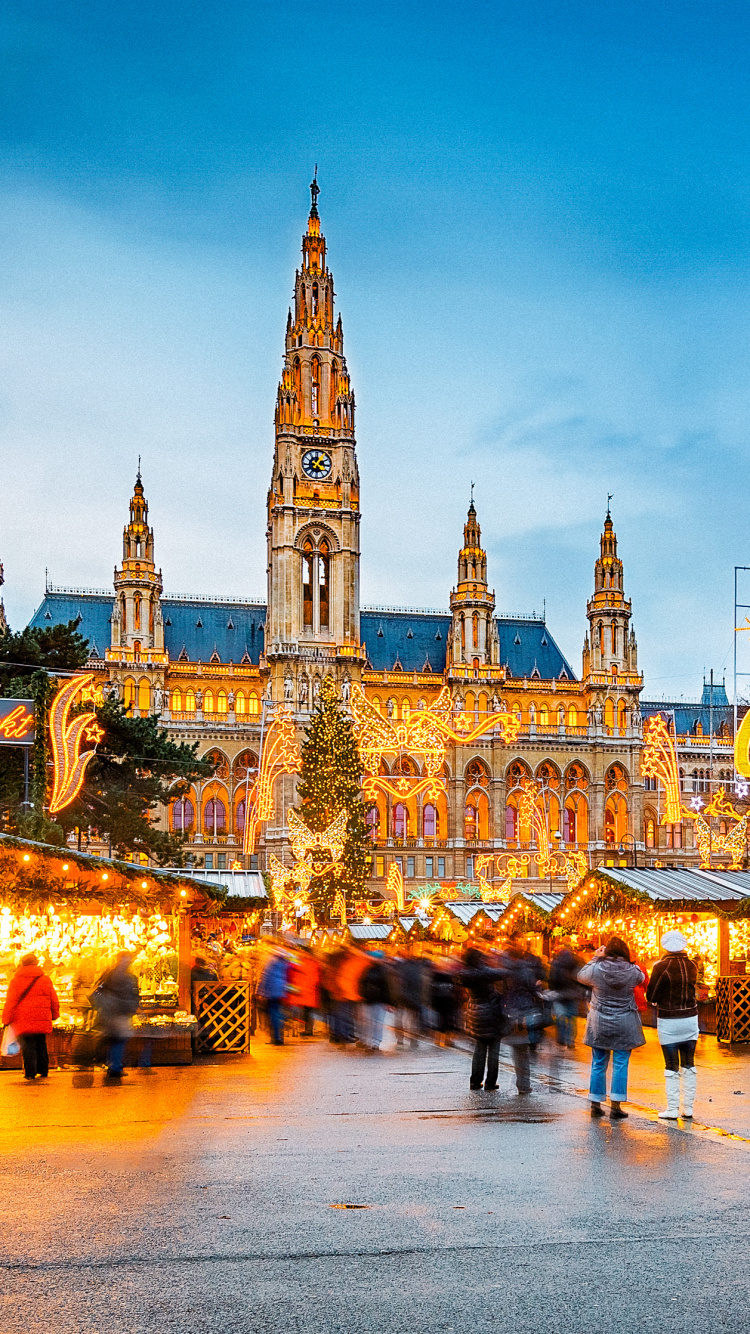 People Walking on Street Near Brown Concrete Building During Daytime. Wallpaper in 750x1334 Resolution