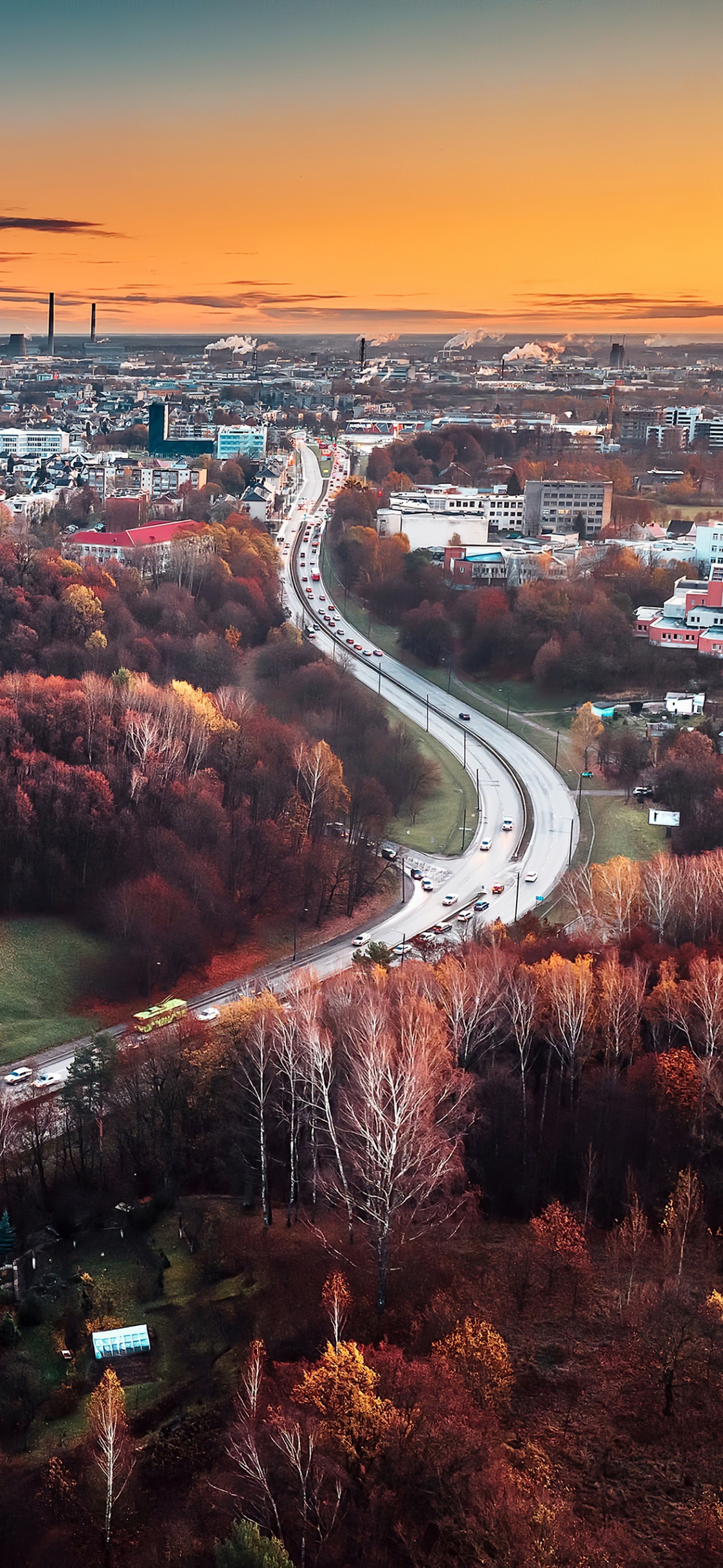 Aerial View of City During Night Time. Wallpaper in 1125x2436 Resolution