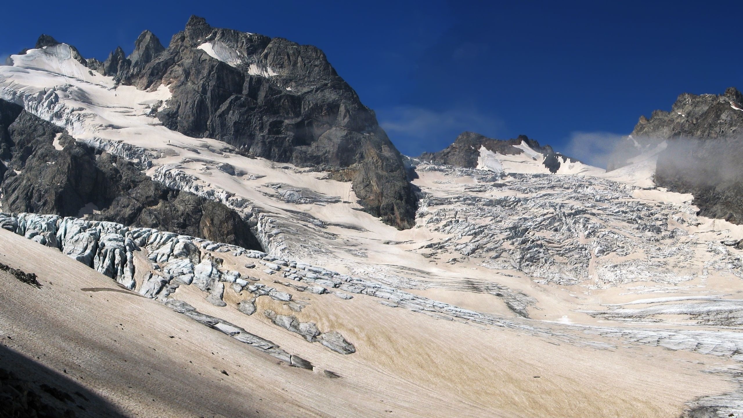 White and Black Rocky Mountain Under Blue Sky During Daytime. Wallpaper in 2560x1440 Resolution