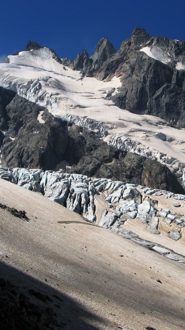White and Black Rocky Mountain Under Blue Sky During Daytime. Wallpaper in 720x1280 Resolution