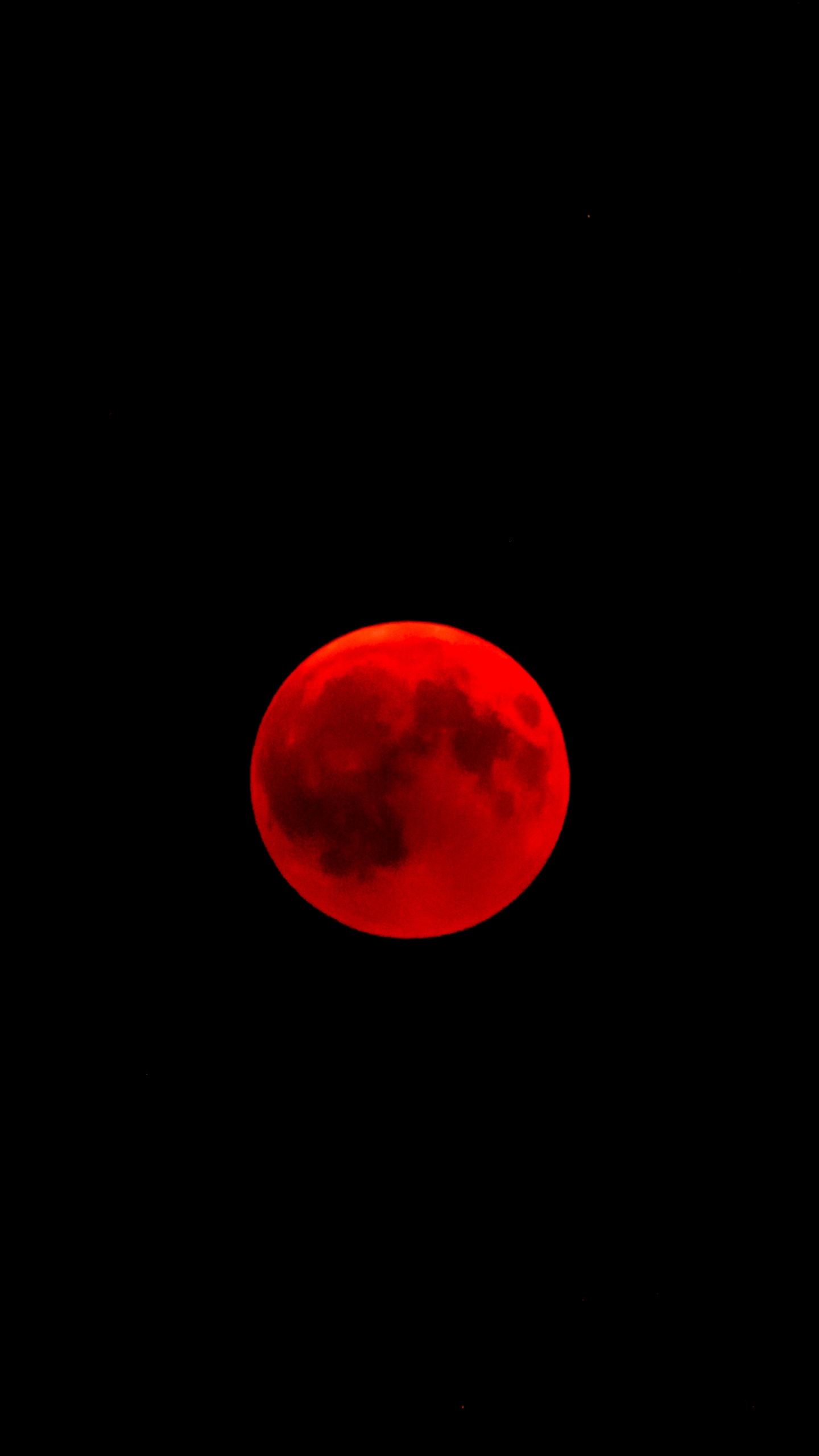 Red Moon in Black Background. Wallpaper in 1440x2560 Resolution