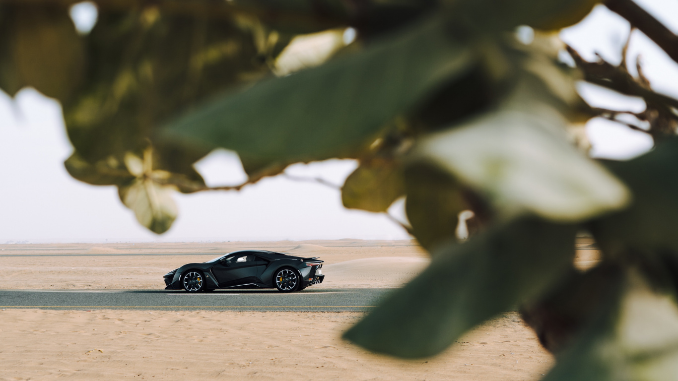 Black Coupe on Brown Sand During Daytime. Wallpaper in 1366x768 Resolution